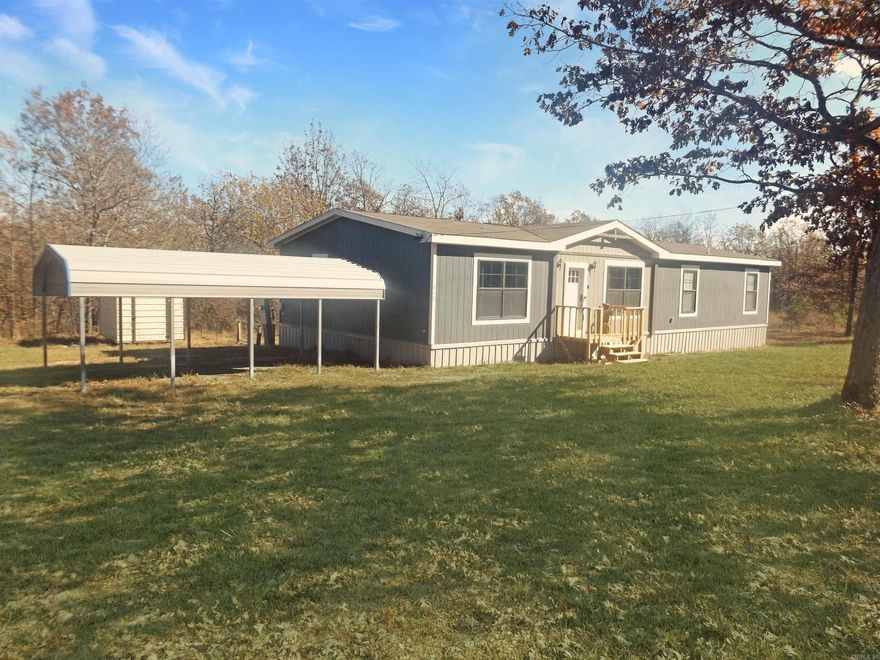 Country living at its best! This 3 bed, 2 bath home sits on 5 peaceful acres. Lots of wildlife! 2022 1680 ft. Clayton Home with an open floor plan, split bedrooms, and a back deck to enjoy nature and its tranquility! All appliances like new. A generator included & riding lawn mower convey at no value.