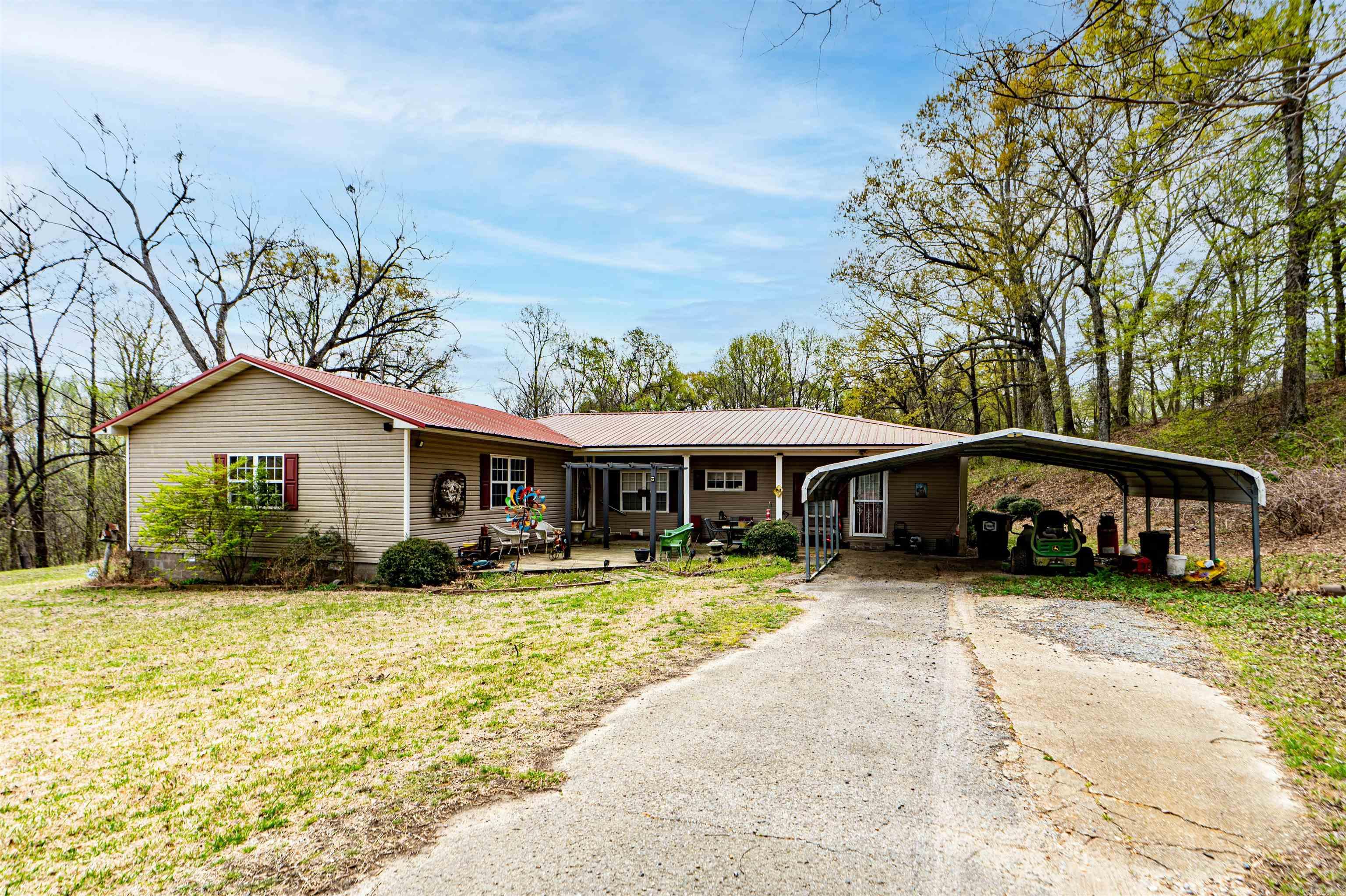 Escape to peace and privacy in this charming 4-bedroom, 2-bathroom home nestled on approximately 9 acres along the scenic St. Francis River in rural Lee County, Arkansas. This beautiful property offers the perfect blend of comfort and nature, with spacious living areas, a cozy kitchen and room to relax both indoors and out. Enjoy stunning river views, mature trees and open land ideal for recreation, gardening or simply soaking in the quiet country lifestyle. Whether you're looking for a weekend getaway or a forever home, this property offers endless potential and natural beauty. Don't miss this unique opportunity to own a slice of the Delta!