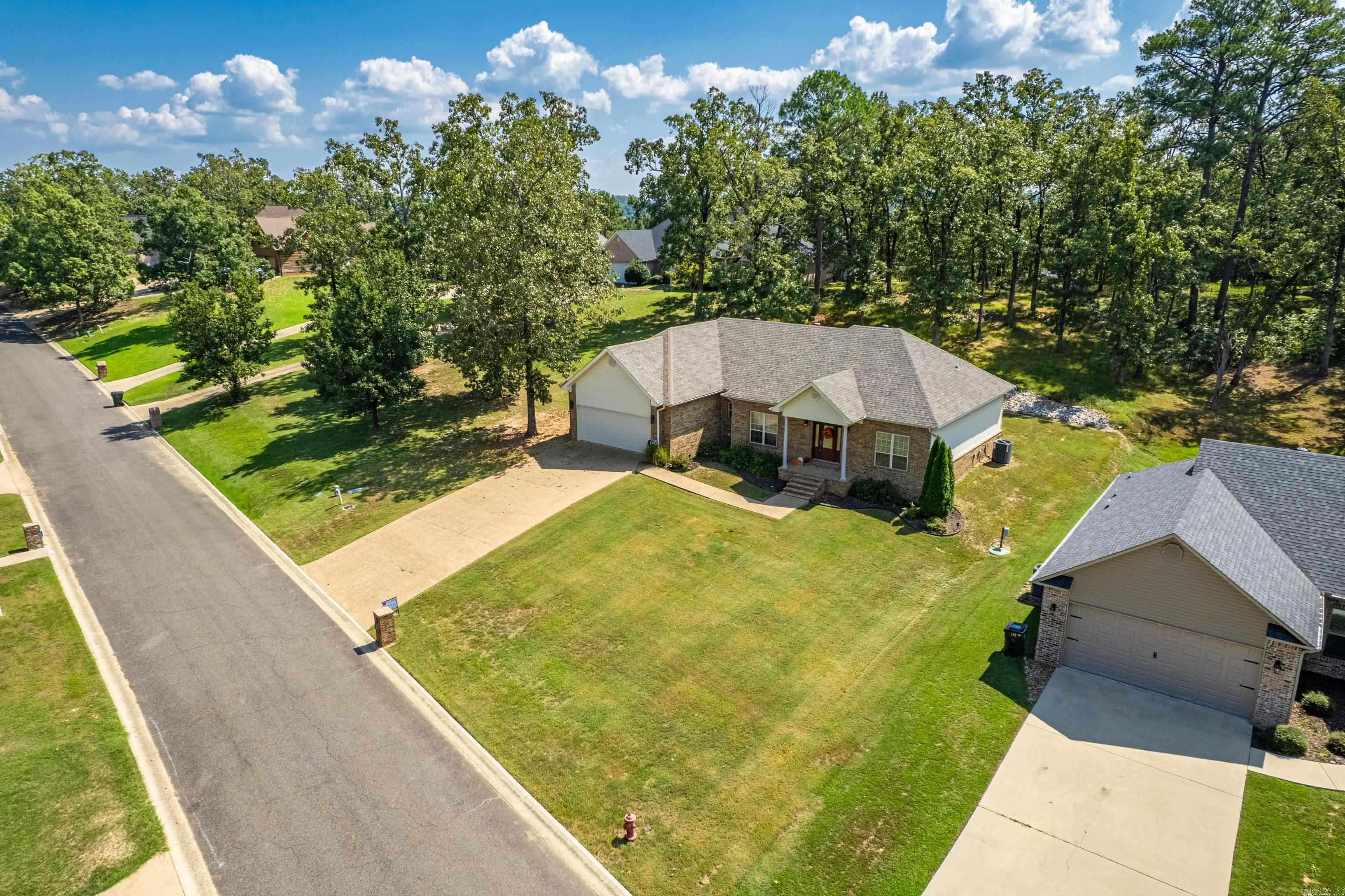 Ready for a new home with room to grow in the comfort of an established, quiet neighborhood? This move-in ready three bedroom, two full baths, one level split floor plan, will check all the boxes. Inside, you'll discover all the possibilities for entertaining family and friends with an open floor concept. The eat in kitchen sits just off the dining/living area within reach to family or when entertaining guests. The master bedroom has TWO walk in closets you won't believe! Two guest bedrooms share a full bath and are located opposite the master, providing privacy for all. Outside, enjoy sitting under the pergola on cool, fall nights by the fire pit. A french drain was installed several years ago and covers the entire backyard to prevent water intrusion. New HVAC in 2024, water heater and roof are less than three years old. Schedule your private showing today to see this gorgeous, well kept home!
