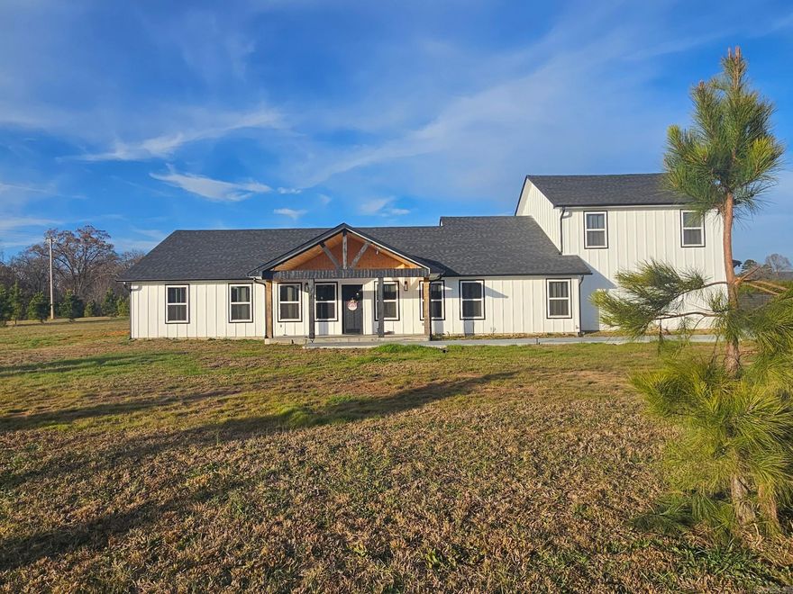 Welcome to this beautifully crafted brand-new 2025 custom home, perfectly situated on 11private acres offering space, style and modern comfort. This thoughtfully designed residence features 4 spacious bedrooms and 2.5 bathrooms, blending luxury finished with everyday functionality and low maintenance cement plank siding on the exterior. Step into an open-concept living area highlighted by quartz countertops, sleek cabinetry, and smart appliances that bring convenience and efficiency to the heart of the home. The kitchen flows seamlessly into the living and dining areas, making it ideal for both entertaining and daily living. Upstairs, enjoy a dedicated media room, perfect for movie nights, gaming or a private retreat. Built with quality craftmanship and contemporary design throughout, this home offers the rare combination of new construction, modern technology and expansive land - ideal for privacy, recreation, or future development.  Agents see remarks.