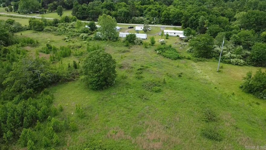 Great opportunity for investors or developers! This mobile home park sits on 13.89 acres and includes 4 mobile homes, two are currently rented for $375 and $525, all of which will convey with the sale. One additional unit currently pays a lot rental fee of $200, offering immediate income potential. Property has utilities on site, including water, septic, and electricity. Plenty of space to expand or develop further with approximately 13.89 acres. Whether you're looking to build out additional units or enjoy steady rental income, this property has excellent potential. OWNER FINANCING CONSIDERED WITH 20% DOWN!