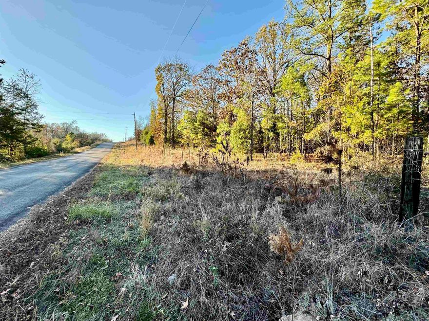 Gorgeous 7.70 acre tract that sits on a corner lot. There are utilities available and paved roads. Perfect for a wonderful home setting. No restrictions, Mobile homes are allowed.