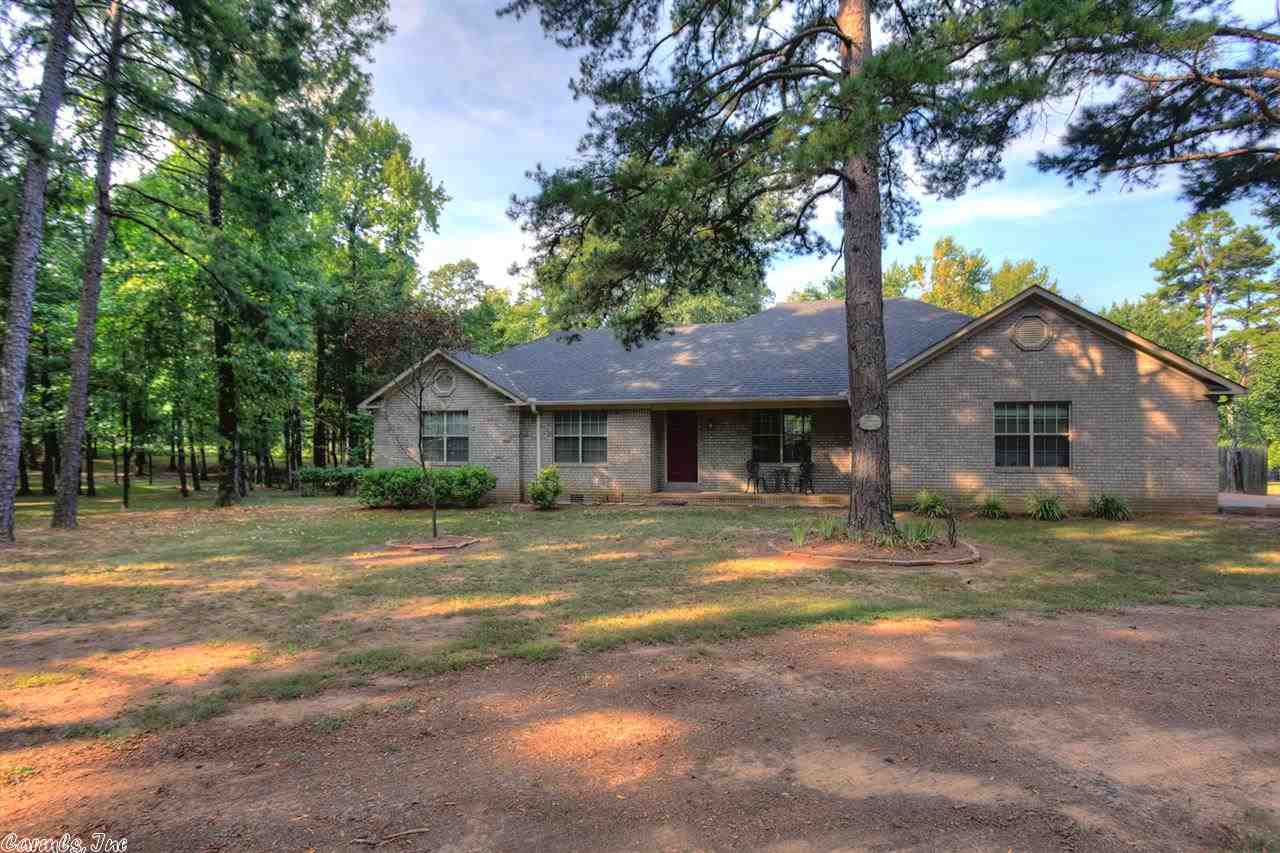 This beautiful home offers 1,978 square feet with 4 bedrooms/2 baths and an office and sits on just under 2 acres of land. Located in a cull-de-sac, this home is minutes from the Arkansas River, yet comfortably close to schools, shopping, and restaurants. The perfect blend of privacy and convenience. Watch the leaves change from the screened in back porch and enjoy the picturesque view. This home also has a side loading 2 car garage, and storage shed that will convey with the property.