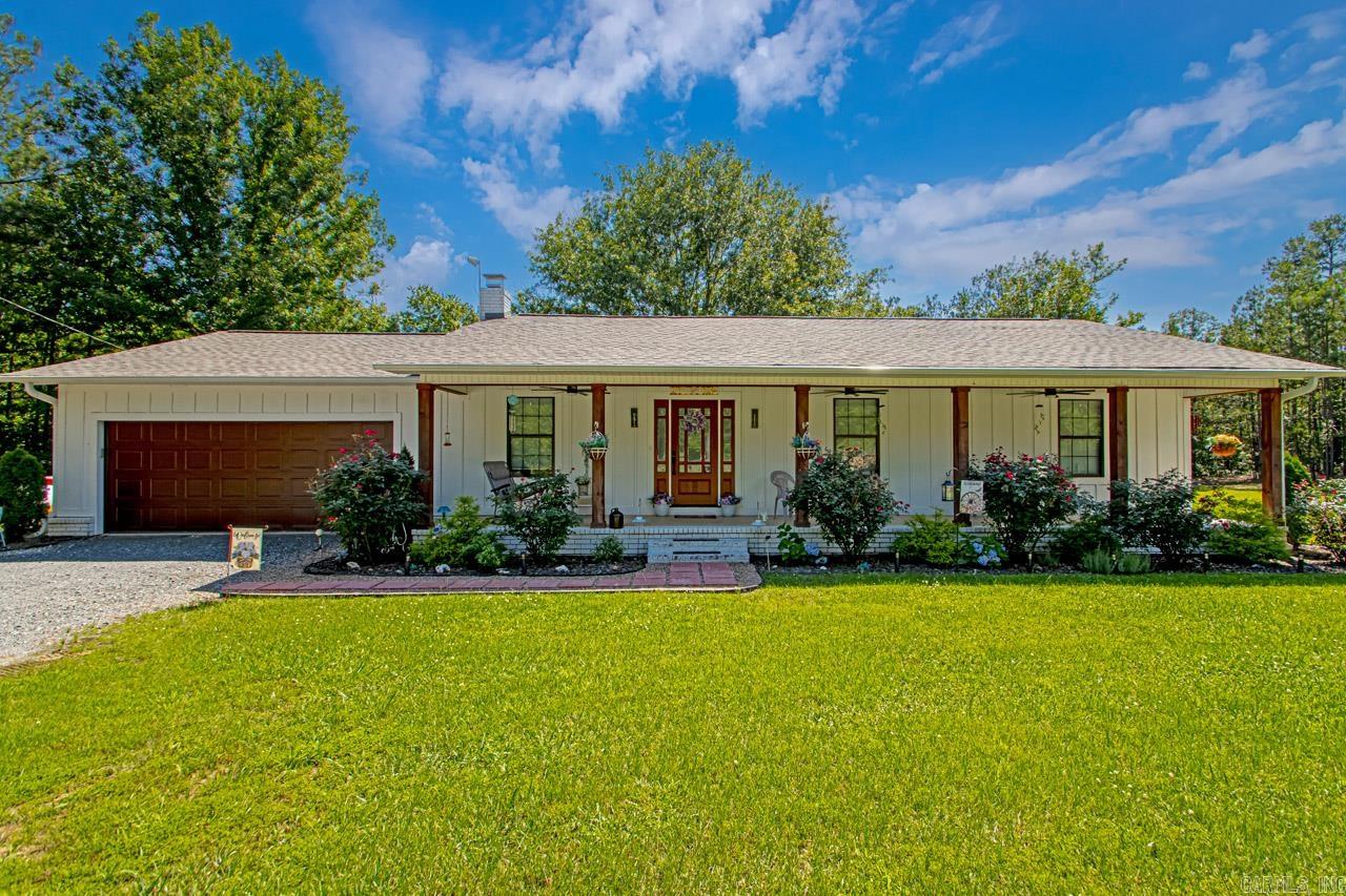 Beautiful home with recent upgrades throughout the home. Primary Suite offers a large tiled shower with beautiful accent wall. Second bedroom offers accent wall as well. Brick Fireplace (decorative), Generac (whole house) Generator, Fiber optic internet. All appliances to convey with purchase of the home and also additional furniture throughout to be included in purchase. Generator is powered by propane. Large deck on back with step downs to second platform and a seperate firepit. See associated documents for details on items that remain with the home, additional upgrades, full legal and Seller's Property Disclosure.