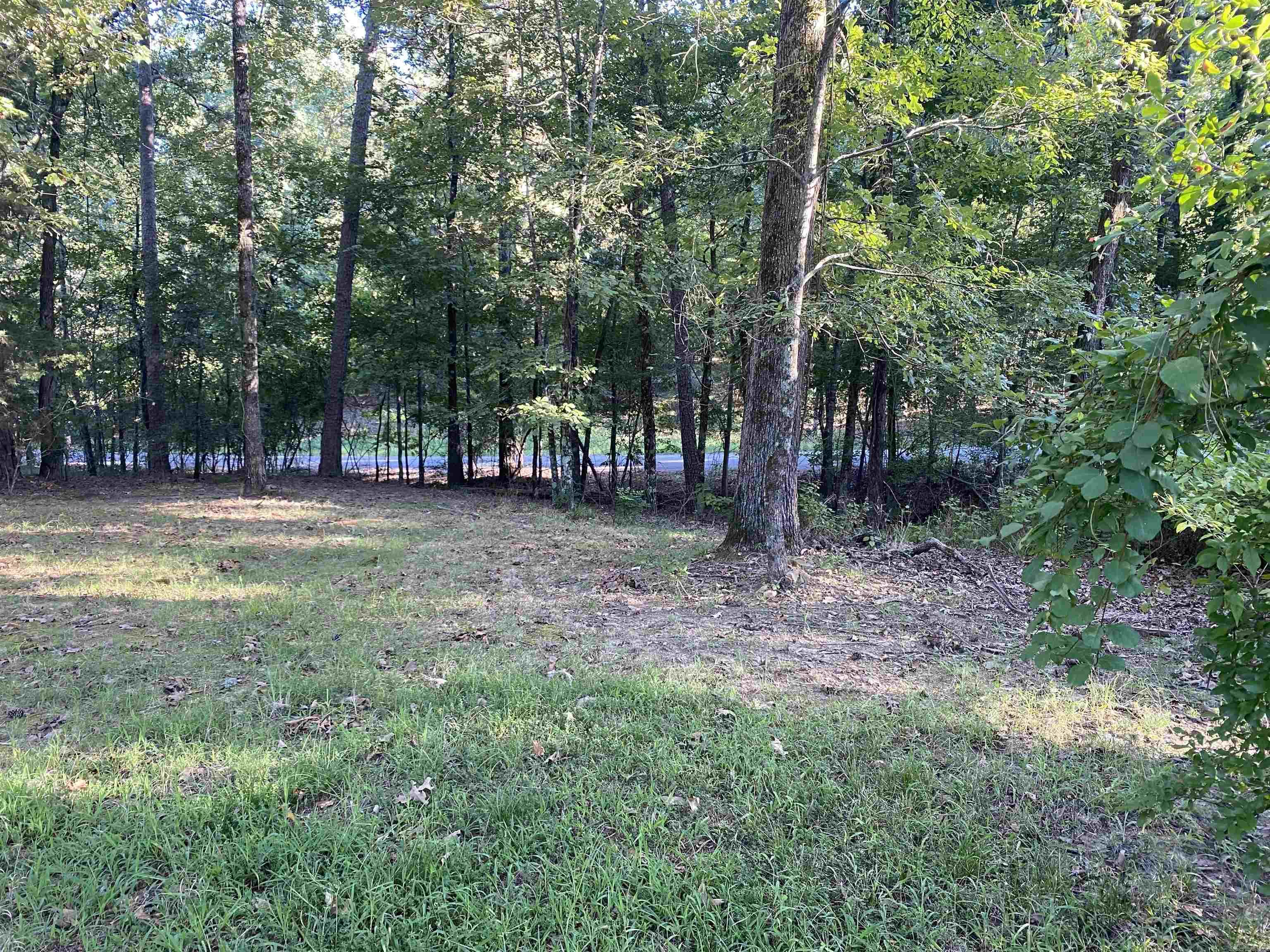 Great Location!!! Nice almost 1/2 acre lot in quiet neighborhood - perfect for building your next home! Level lot with mature hardwood trees. Peaceful, serene living close to interstate, shopping, schools and church.