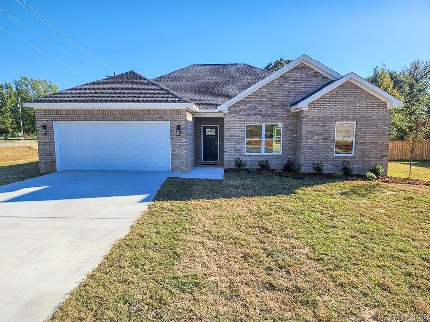 Welcome to Lewis Cove! This 3-bedroom, 2-bath new construction home offers 1,620 square feet of thoughtfully designed living space on a desirable corner lot just across from Wooster Elementary. Inside, youāll find an open-concept floor plan with LVP flooring throughout, granite slab countertops, LED lighting, and an inviting electric fireplace in the living area. The split layout provides privacy for the primary suite, which includes a custom tile shower with glass door, a relaxing soaker tub, and a spacious walk-in closet. Outside, enjoy the covered back porch with ceiling fan, a brand-new wood privacy fence, and a two-car attached garage. Conveniently located just minutes from Interstate 40 via Hwy 25, this home offers the perfect balance of peaceful living and easy access to all the amenities of town. Move-in ready and built with attention to every detail!
