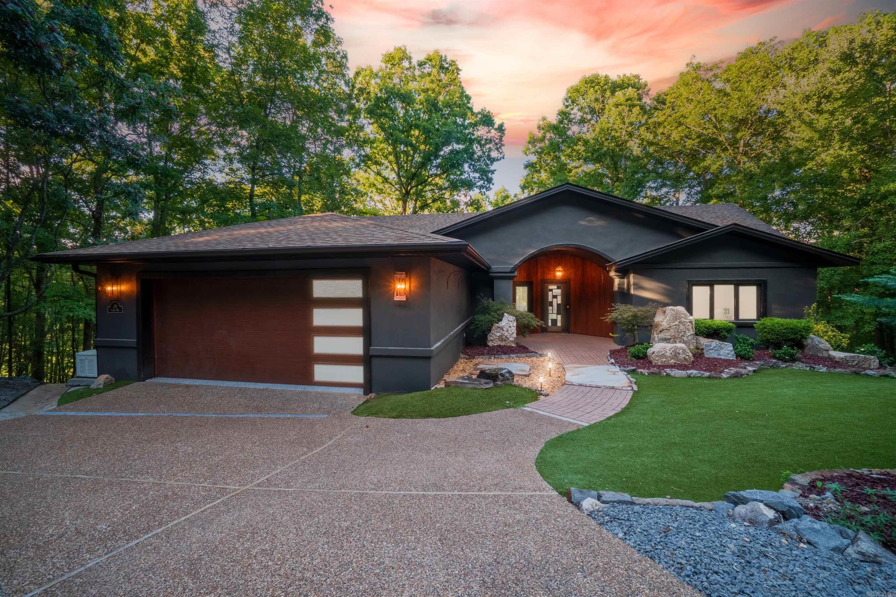 Better than NEW! PRIVATE RETREAT with Vista Views of Golf Course. Features Large kitchen, Island and breakfast area overlooking #4 pond, fountain, green and fairway. Welcome to this beautifully balanced 4-bedroom, 2.5-bath home offering 3,428 square feet of well-designed living spaceānot too big, not too smallājust right for comfort, functionality, and entertaining, with Theater Room & Expansive Decks! Upstairs offers an open concept floorplan with a wall of windows to enjoy the views from every angle. This thoughtfully laid-out home features a second master suite, ideal for multigenerational living or hosting guests with ease and privacy. The lower level includes a stylish bar complete with an ice maker and beverage cooler, plus an additional bedroom and a spacious theater/media room that can also serve as a home gym or flex space. Enjoy the outdoors year-round on the large decks on both levels, perfect for entertaining or simply relaxing with room for everyone to spread out. The low-maintenance yard and landscaping free up your time while still offering elegance and charm! A small, fenced area creates a safe/sweet spot for pets or kids. Golf cart Included. See agent remarks.