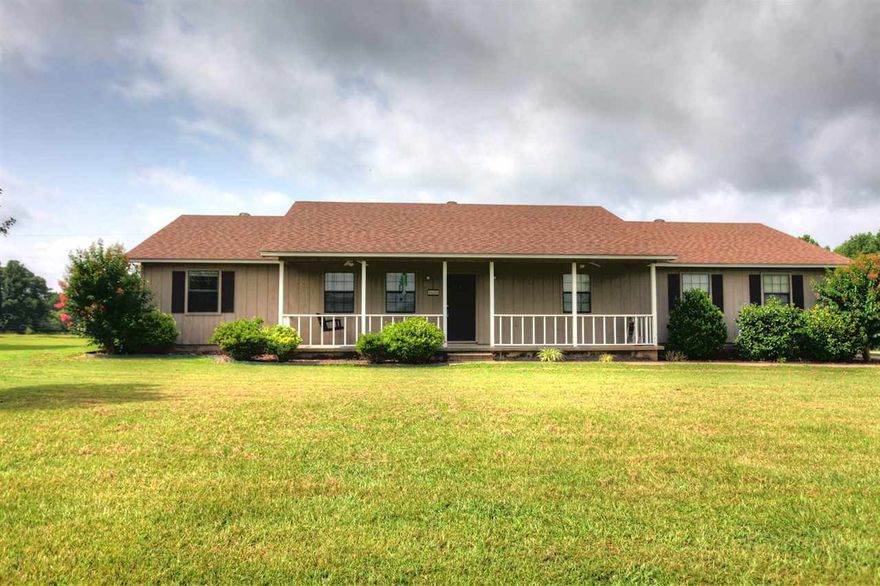 This home has beautiful views from all angles,   it is conveniently located, very close drive to all surrounding cities.  Beautiful wood floor, tile in the wet areas, granite and stainless steel appliances.  Covered front porch with swing to relax and soak up the views.  Back deck for entertaining, new heating and air.  New hot water tank.  So many great features to this cute, comfy home!