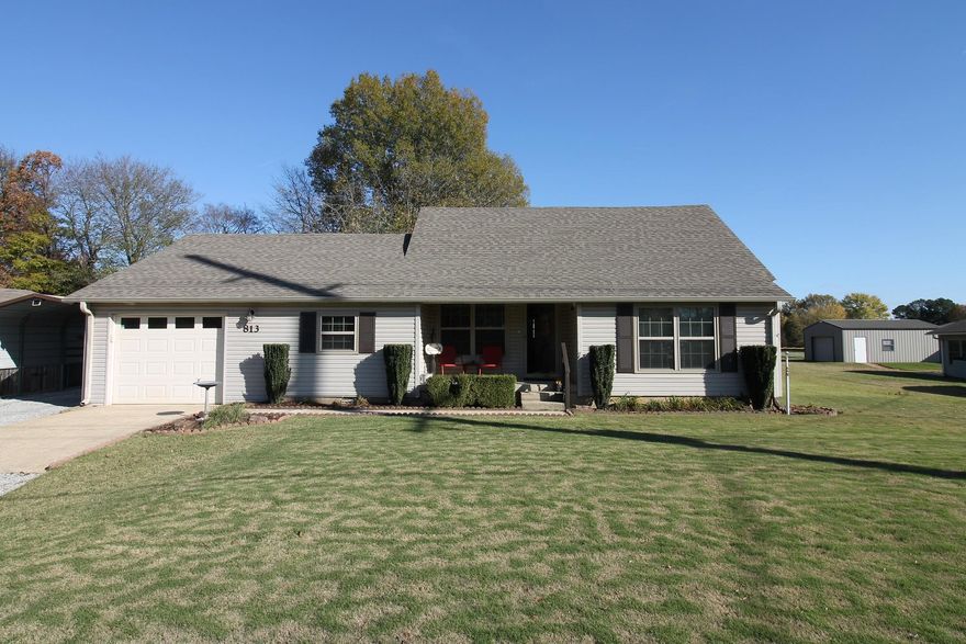 Charming Home on the Edge of Town . Welcome to your dream home! This beautifully maintained 3-bedroom, 2-bathroom residence features modern LVP flooring throughout and is set on a spacious lot, offering plenty of room for outdoor activities. Enjoy the comfort of a large living room perfect for gatherings and a roomy main bedroom that serves as a serene retreat. Step outside to a large deck, ideal for entertaining and relaxation, and take advantage of the convenient storage building for all your outdoor equipment and hobbies. Recent upgrades include a newer roof, updated windows, and a reliable water heater, ensuring peace of mind for years to come. Don’t miss this opportunity to own a lovely home in a desirable location! Schedule your showing today!