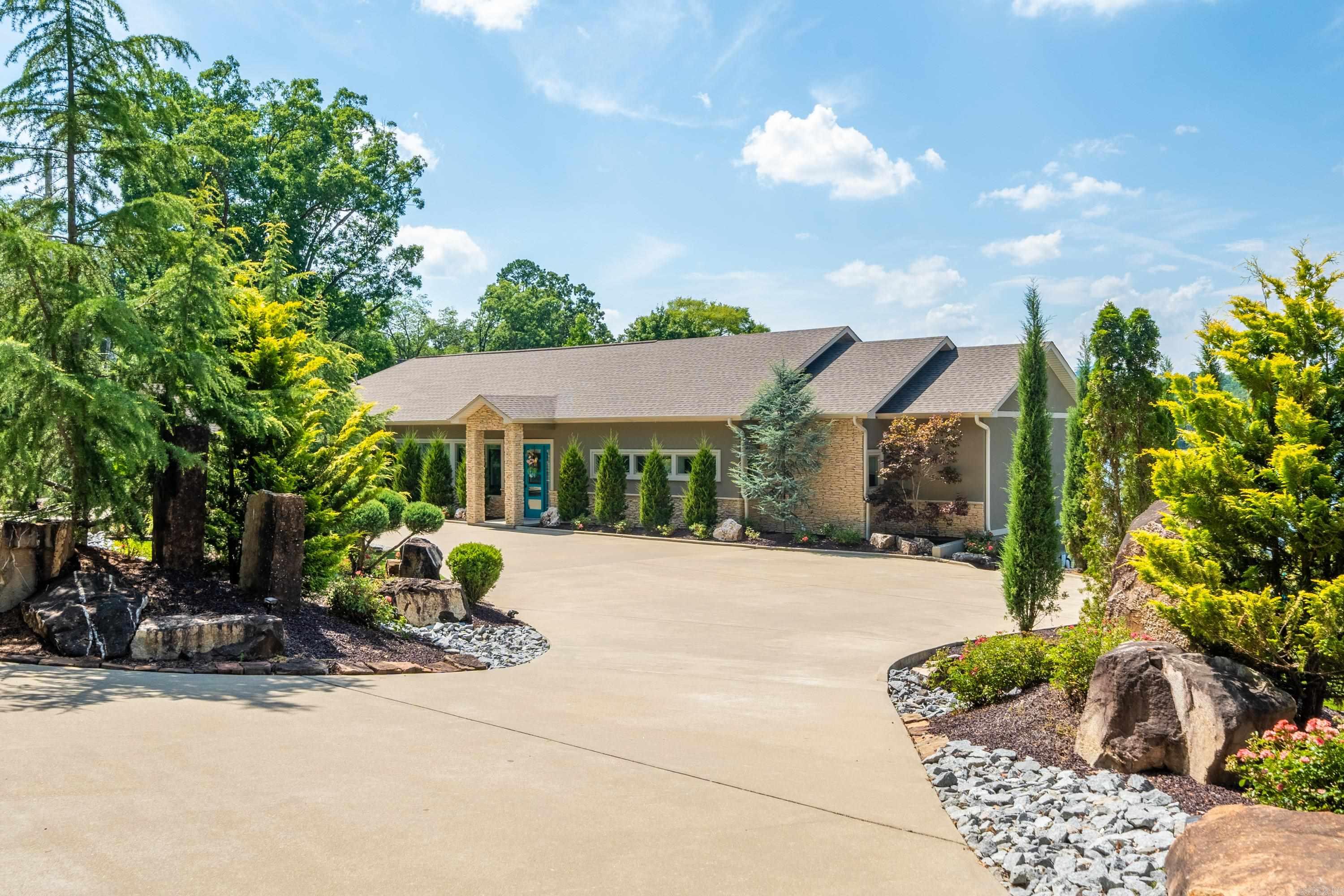 Introducing the epitome of luxury lakeside living on Lake Hamilton at 524 Bayshore. Nestled in the heart of Hot Springs this home offers an unrivaled experience in short-term rental accommodation. Perched majestically on the pristine shores of Lake Hamilton, this property is over 3600 square feet of carefully designed living space, meticulously crafted to exude sophistication and charm at every turn. The residence boasts panoramic views of the serene waters, inviting guest to immerse themselves in the tranquility of lakeside living. With approximately 168 feet of private lake frontage, guests have exclusive access to the shimmering water, where endless aquatic adventures await. A private boat pier with tie ups on both sides offers the perfect launching point for exploring the vast expanse of Lake Hamilton, whether by boat, jet ski or paddleboard. For those seeking relaxation and rejuvenation, indulge in the ultimate in leisure at either of the two swimming pools and hot tub, where the soothing water provide the perfect escape from the hustle and bustle of everyday life. Cont'd in Agent remarks...