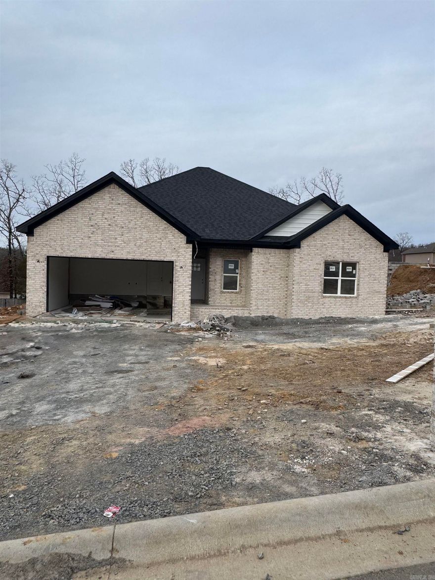 4-Bed, 2-Bath NEW CONSTRUCTION HOME! Located only 2-3 minutes from 67/167/I57 - this is a new neighborhood is soon to be ready for a new family! This home is ideal for someone living & working in the greater Cabot area, commuting to LRAFB, commuting to Conway, commuting to Searcy or elsewhere! Entering the homes foyer you see the living room ahead of you w/9' tall ceilings. This is an open concept home w/a split floorplan. The kitchen, dining & living room provide an ideal home for entertaining & making memories! The Master Bed & Bath & Laundry are located on the left rear of home. Laundry connects to Master Bed making this easy to move clothes to your bedroom too! The other three bedrooms are located on the front right of the house as well as the guest bathroom being located in the center of the home. These homes are fantastic homes for most all budgets whether a first-time home buyer, a first upgrade home or retirement home to downsize. Not to mention this home is also 3-minutes to the Cabot Schools Pre-K North and 9-minutes to Greystones Cypress Creek Golf Course too! Fantastic location & fantastic home! Do not miss out! Projected Finish Mar 26. See Agent Remarks.