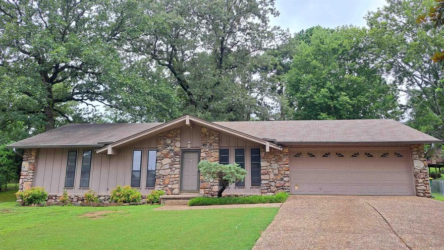 Wonderfully situated on a peaceful cul-de-sac, this home has a fresh, clean look & feel with new paint and carpet. The backyard is large with grand oaks and beautiful bushes that shade a custom patio. The large den has plenty of room for relaxing and entertaining with a unique look provided by the wood paneling. A gas generator comes with the house to provide that extra security and comfort when the power goes out; plus, the refrigerator, washer and dryer all convey. The house also has added storm windows.