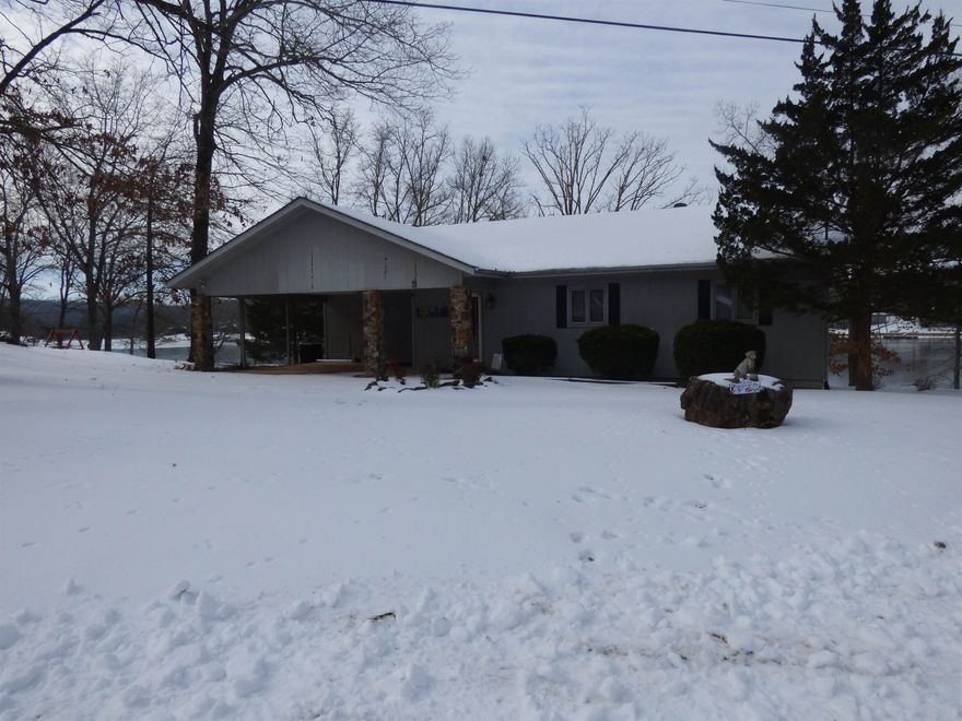 Imagine morning coffee looking out onto beautiful Lake Thunderbird. This 3 bed 3 bath home with an expansive patio area boasts a beautiful boat slip making it easy to park your pontoon.  The spacious downstairs is perfect for hosting friends and family, or making a private suit where guests can have their own get away area that walks right out to the lake.  Lots of natural light throughout the house and plenty of access to the outdoors. Tons of storage space for all of your lake toys and extra's!  Don't miss out on this gorgeous property, call and schedule your tour today.