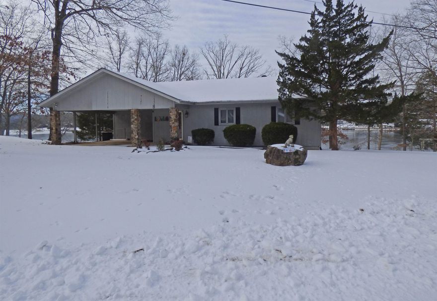 Imagine morning coffee looking out onto beautiful Lake Thunderbird. This 3 bed 3 bath home with an expansive patio area boasts a beautiful boat slip making it easy to park your pontoon.  The spacious downstairs is perfect for hosting friends and family, or making a private suit where guests can have their own get away area that walks right out to the lake.  Lots of natural light throughout the house and plenty of access to the outdoors. Tons of storage space for all of your lake toys and extra's!  Don't miss out on this gorgeous property, call and schedule your tour today.