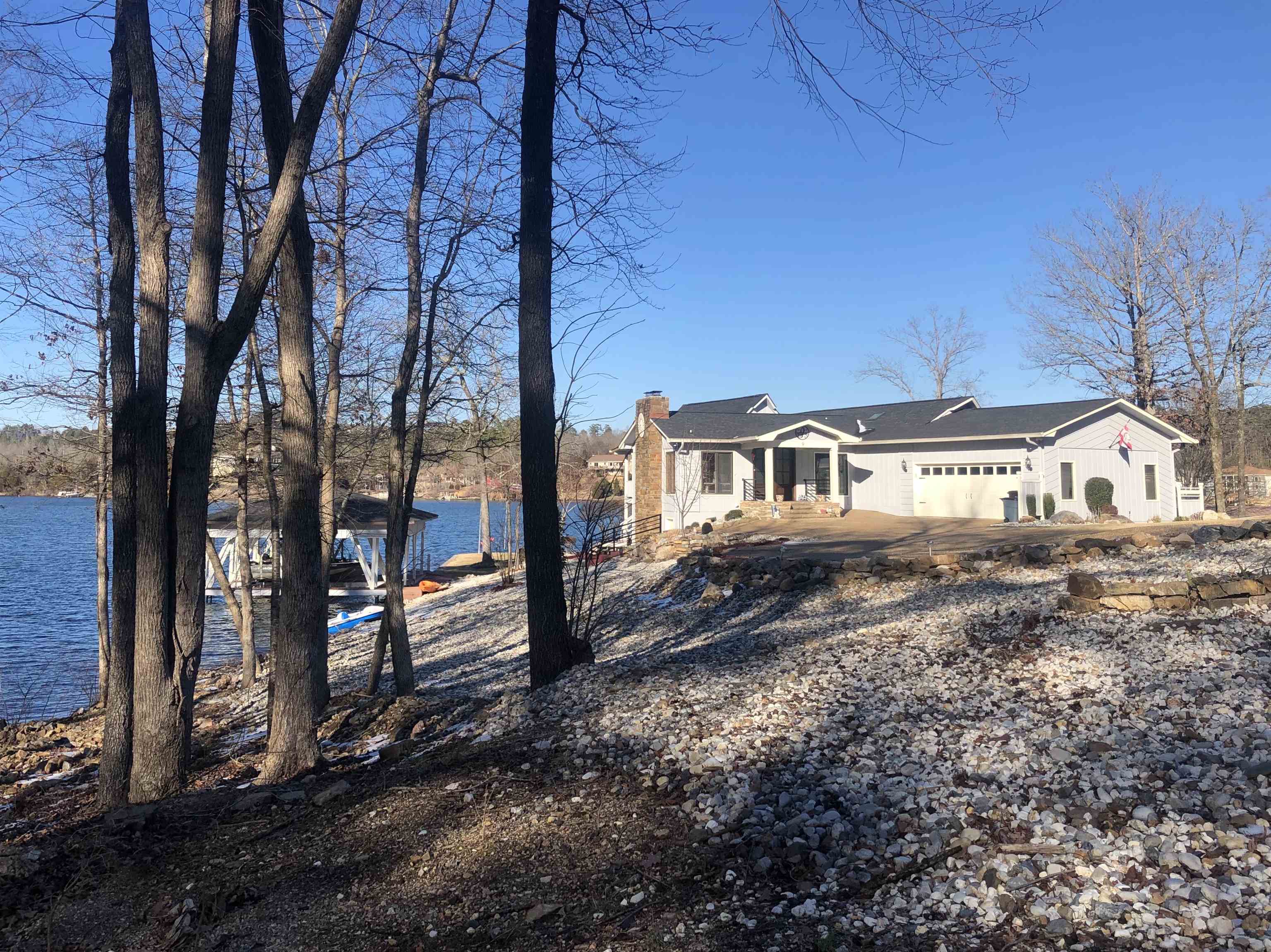 Updated Lake Balboa Home! Large windows with incredible views. Great Room with vaulted ceiling, fireplace, sunroom. Kitchen with granite countertops. Lower level finished with living area, kitchen and workshop. Large deck for outdoor entertaining. Patio area lower level. Boat dock with 2 stalls and lifts. Extra Landscaping. Must see. Agents see remarks