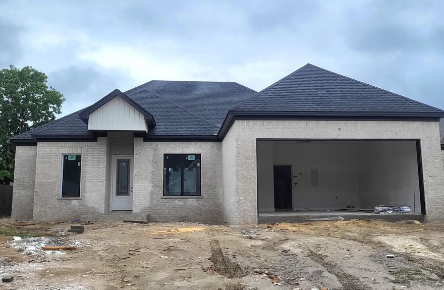 Stunning all brick WLR new construction sits on a level lot near the end of a large cul-de-sac lot. offering privacy and a peaceful setting. Inside features 11-foot ceilings in the open entry and living area.  The remainder of the home features 10-foot ceilings which creates an open airy feel throughout the home.  The light filled great room flows seamlessly into the well-designed kitchen, complete with a large walk-in pantry.  This home has a dedicated office or study, and the layout offers flexibility for work and everyday living.  The 15 x 14 primary suite feels like a private retreat, featuring a spa-inspired bathroom with a tub, separate shower and dual sinks.  Enjoy outdoor living on the spacious covered patio. Built by a trusted builder with over 30 years' experience.   This home blends quality craftsmanship with a thoughtful design. Call for your appointment today!