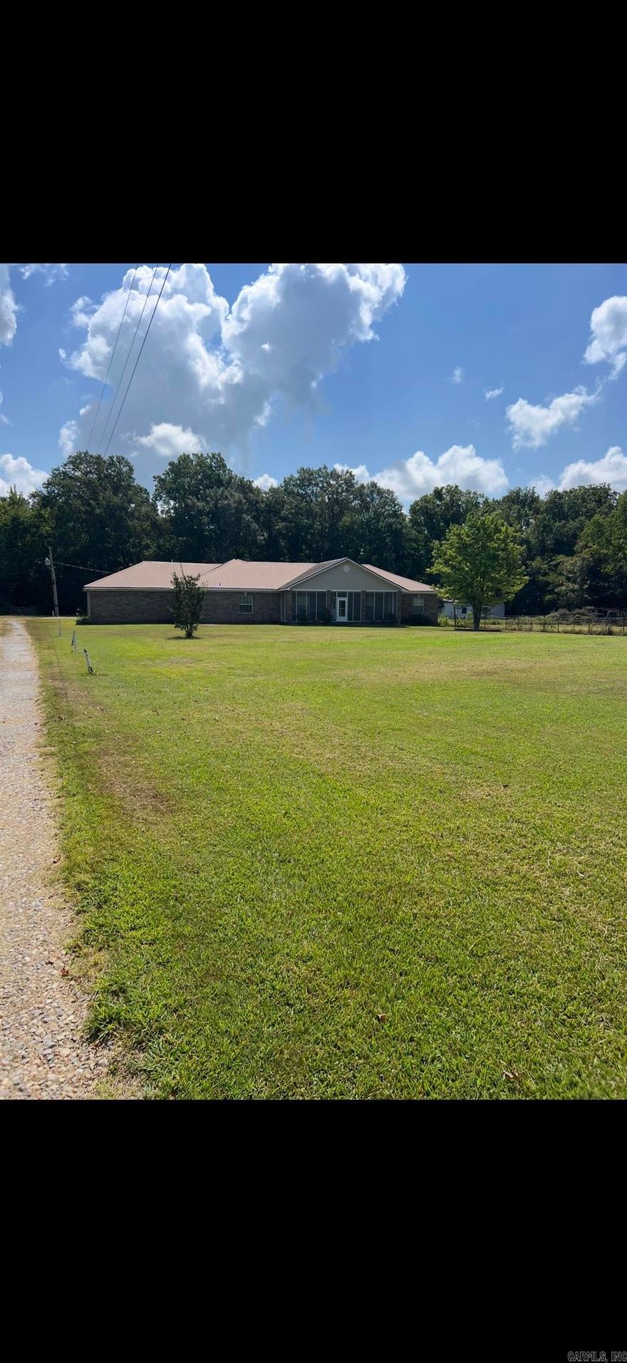 This beautiful home features a 3-4 bedroom, 2.5 bath home sitting on 5 acres, complete with a generator for a peace of mind. The main home offers a functional floor plan perfect for family living or entertaining. Also included is a separate 2- bedroom house that need some TLC but has great potential- ideal for a mother-in-law quarters. guest house, or rental income opportunity. Enjoy the privacy of country living. 24-hour notice required for all showing.