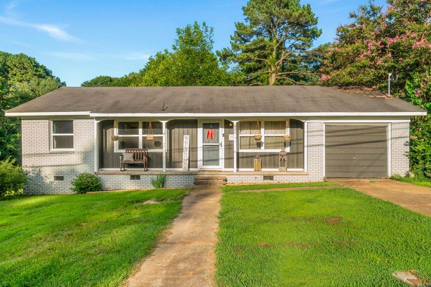 This sweet home in the heart of Searcy has been cared for and now it’s ready for someone new to fall in love with it. With 3 bedrooms and 1.5 bathrooms, it’s the perfect size for someone just starting out or anyone searching for a place that feels like home. Over the years, thoughtful updates have made this home more efficient and move-in ready: a freshly painted kitchen and breakfast nook in 2020. In 2022, the exterior received a fresh coat of paint, a new privacy fence, and a new hot water heater. Energy efficiency and comfort were further improved with new energy efficient windows and a brand-new HVAC system in 2023, plus brand-new attic insulation added in 2024.There’s character here - original hardwood floors throughout most areas, a cozy extra nook that’s perfect for curling up with a book or making into a small second living space and a spacious laundry area! Love the warm natural light that pours into this home. The kitchen is just adorable! The backyard is a true highlight, patio area and fenced for pets or play, but the property line extends well beyond the fence (gate), giving you even more space to garden and host friends! 3-tab roof (2017) Wall gas permanent heater!