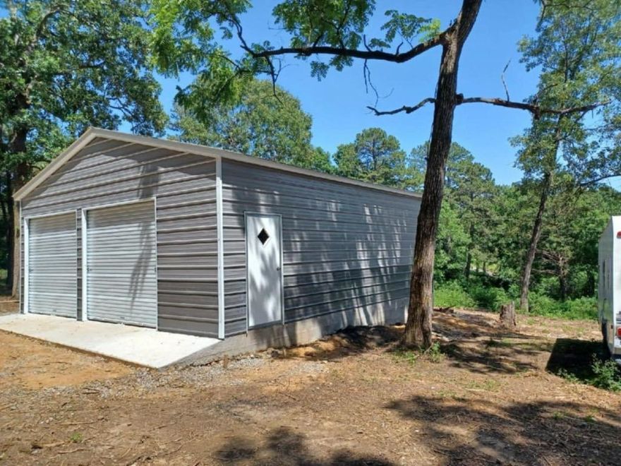 This is a great corner lot with over 2 acres. New Metal 26 X 30 Shop/Garage on a concrete slab. No restrictions, Mobiles are allowed! This property is mostly cleared with septic that has been inspected, public water, electricity, and a well. Don’t miss the opportunity to make this ready to go property yours! Call today!  12X28 cabin does not convey.