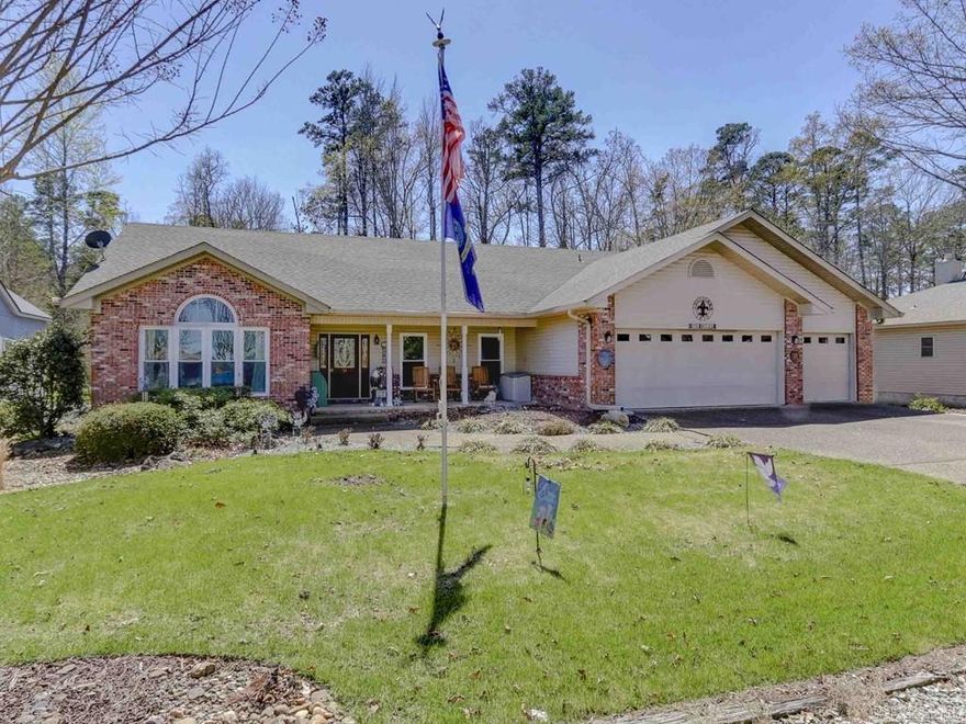 ATTENTION VETERANS!! Low interest (3+%) assumable VA Loan available to qualified military families--This could result in tremendous future savings!  Well-featured one-level home on a level lot that also sports a Balboa Lake view. Large detached h/c separate workshop in back. This is a spacious home in a beautiful, tranquil and highly desirable neighborhood with a 3-Car garage. Welcoming front porch leads into the Formal Living, Dining room, Great Room and h/c Arkansas room. Separate Primary BR ensuite with large walk-in closet, walk-in tub and walk-in shower. Vaulted and Tray ceilings. You'll stay warm and cozy with the brick FP with duct work that heats the entire house, plus extra insulation AND a generator is included.  Laundry sink, cabinets and great counter space in laundry room. Workshop is not included in square footage. Newer roof, HVAC, Paint, Flooring, Appliances, etc.  Aerial pictures and video in Virtual Tour.  Additional features and updates in Documents.