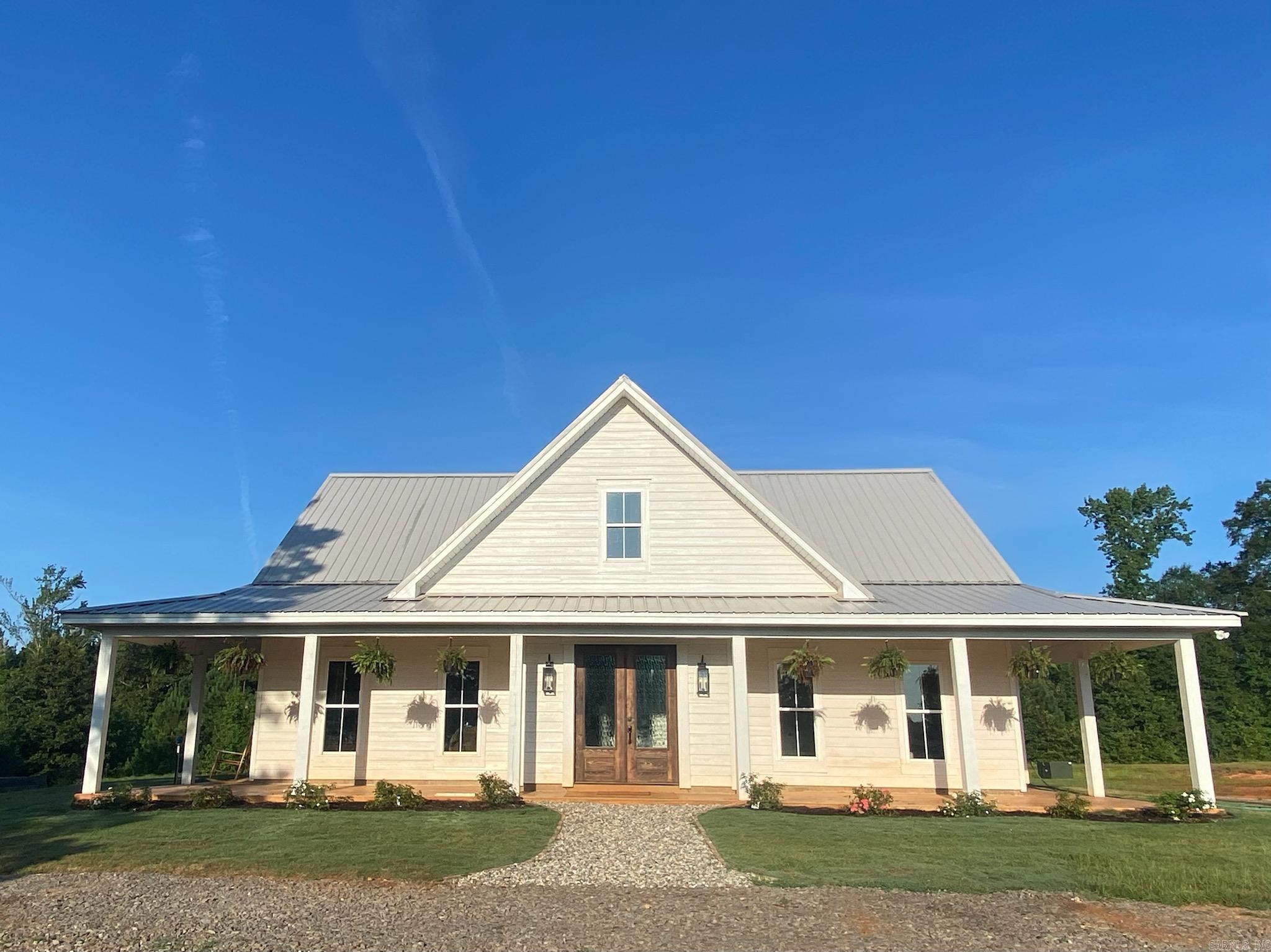 Welcome to 1767 Degray Road, the dream home you've been looking for. Newly custom-built home in 2023, nestled on 4.00 acres in the desirable Degray Community. Step inside to find your spacious 4 Bedroom, 2 bath home with 2282 sq ft of comfort, functionality, and style! Vaulted ceilings with massive beams soaring over stunning stained concrete floors. Gather the family and guests galore around the gorgeous granite island in the kitchen or spill over into the separate dining room nook. Primary Suite and one BR downstairs. Access the In-house storm shelter right in the hallway if any storms roll in. Beautiful staircase with Pine steps will make the perfect backdrop for family photos and leads upstairs with 2 additional carpeted Br’s and bathroom. Perfect porch for relaxing and watching the kids or critters play after a hard day’s work. Call today to see this wonderful property that blends upscale amenities with peaceful country charm!