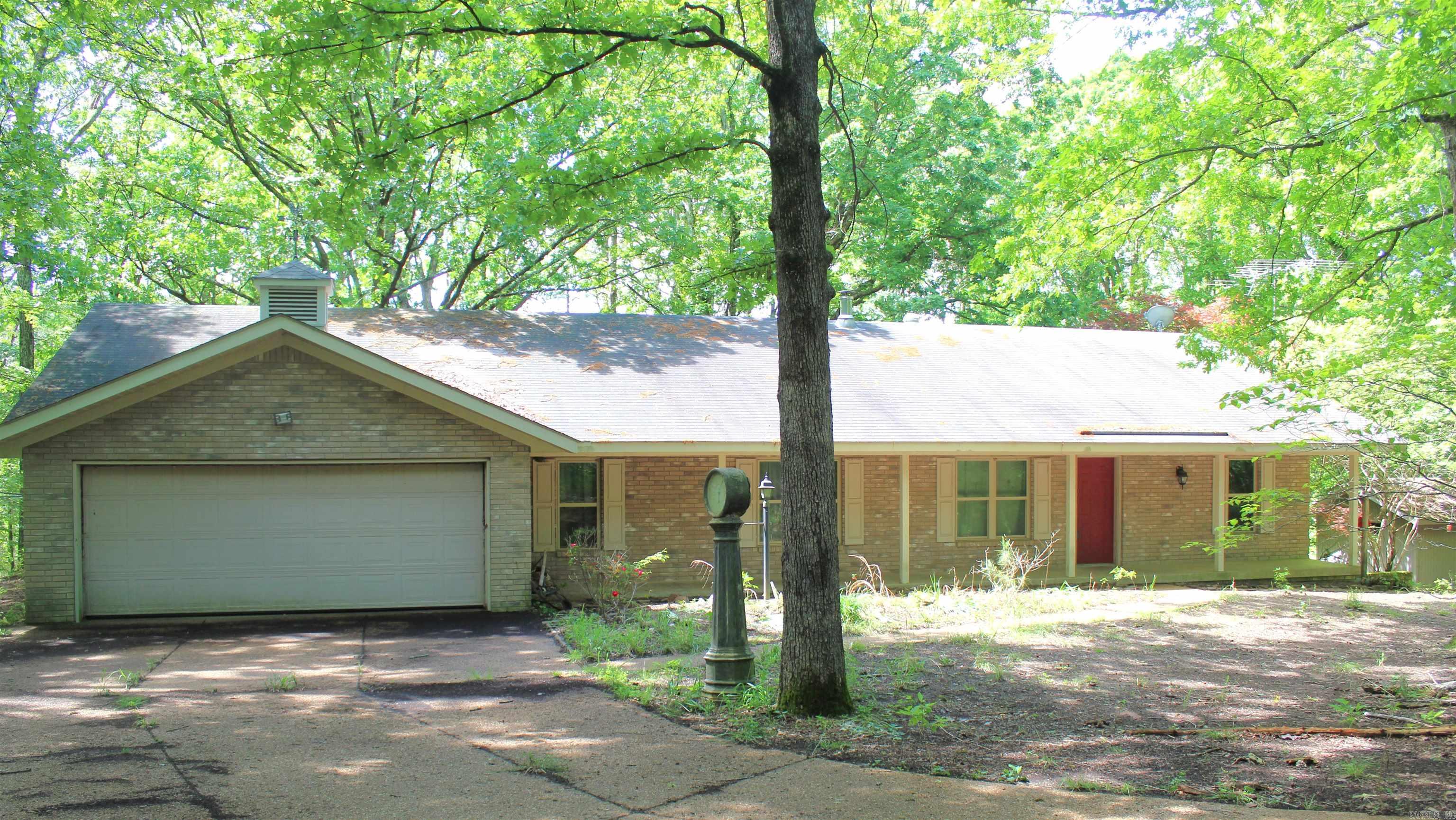 ***Attention outdoor enthusiast*** Welcome to the market this custom built 4 bed 3 bath brick home which includes a walkout basement with additional kitchen and living room. Main bedroom and a spare on the primary level and 2 bedrooms down. Fully fenced 30 acres with gated entrance, home sits back off the highway 650 ft overlooking a large, stocked pond. Abundance of wildlife including deer and turkey with all the privacy you want. This property is a piece of paradise and a must see.