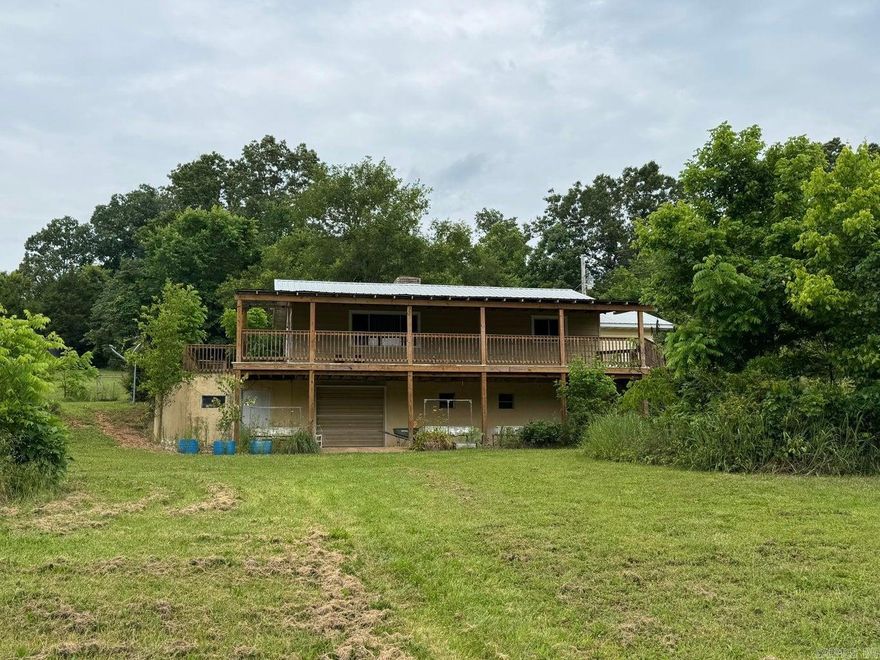 Come sit on this wonderful covered deck and listen to the creek and enjoy the peace and quiet. This 2 bedroom 2 bath home on 3.46 acres +/- has a barn with a fenced area, and lots of fruit trees. Home features a large kitchen with tons of storage, dedicated laundry, primary bedroom with a huge walk in closet, large covered deck, and a workshop area in walkout basement. The HVAC was replaced in 2024.
