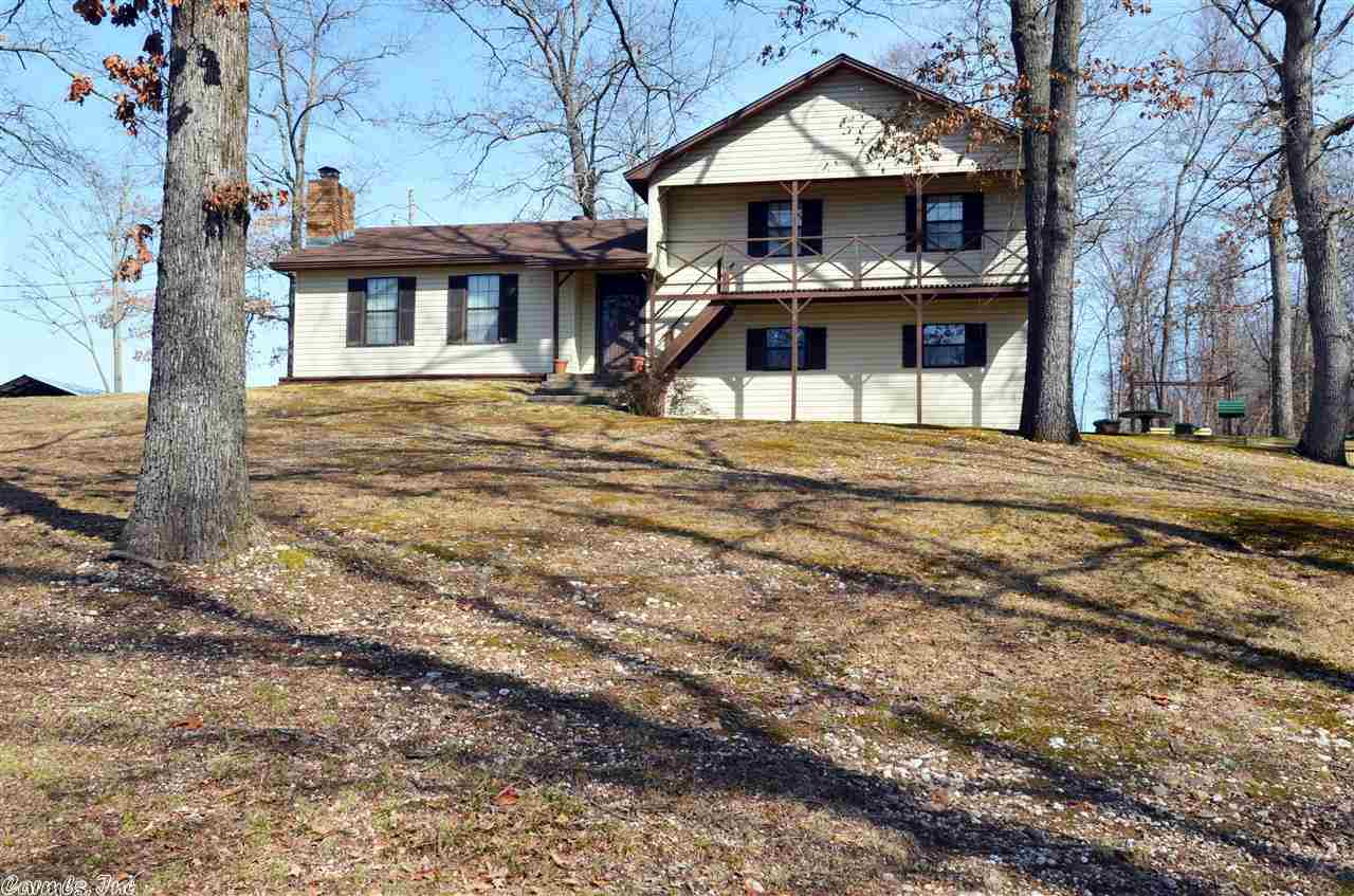 Out but not too far - Like country living, minutes to city - Beautiful, Scenic view at top of the property Tri-Level home has lots of room for kids to roam. Kitchen remodeled, Living room has wood burning fireplace. down stairs could be in-law quarters * Other land available.