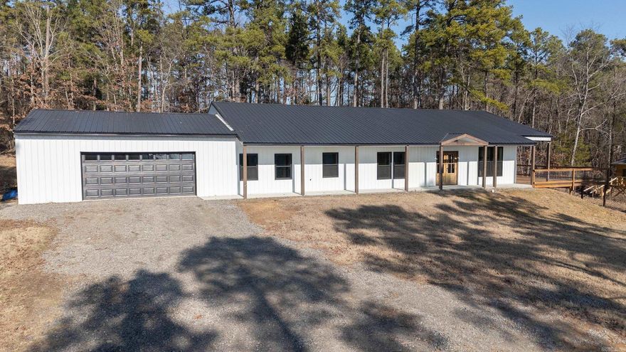 Spacious 2,600 sqft. home built in 2023! 4 bedrooms, 3 bathrooms (1 is a jack and jill design), open floor plan (living, dining, & kitchen), separate family room, quaint office & laundry room. Efficient tankless gas water heater, concrete floors, electric fireplace, gas stove, and farmhouse sink. Outdoors you will find a well, a large deck (20 x 45) built for entertaining, trail through the woods, play house, stunning views on a beautiful tree shaded 3 acres, quiet area feels secluded but within 5-10 minutes of everything you need!