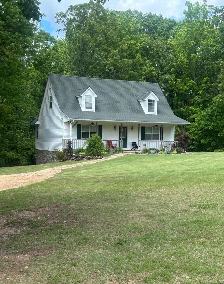 Escape to this serene country retreat, nestled on 6.22 +/- acres, featuring a large beautifully landscaped front yard along with beautiful wooded land—perfect for outdoor enthusiasts who love hunting or need space for a shop building. Enjoy your morning coffee from the back deck, taking in the peaceful forest views, or unwind on the large front porch, rocking in the swing. Ideal for both outdoor living and entertaining, this property provides the best of both worlds. Currently operating as a successful Airbnb, this home offers excellent income potential. With three levels of spacious living, there’s plenty of room for family, friends, and guests. The finished basement includes an entertainment room, two additional bedrooms, and a full bathroom, making it an ideal space for visitors or extended family. Upstairs, you’ll find two cozy bedrooms, with the master conveniently located on the main level. This unique home truly offers endless possibilities. Schedule a showing today to experience this extraordinary property firsthand!