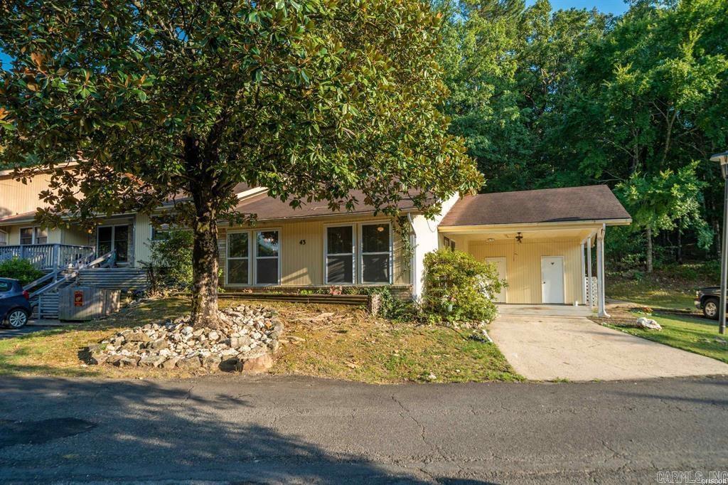 Charming Townhouse in Hot Springs Village! Discover the perfect blend of comfort and convenience in this 2-bedroom, 1.5-bath townhouse nestled in the heart of Hot Springs Village, AR. Enjoy all this vibrant gated community has to offer—11 beautiful lakes, 9 world-class golf courses, country clubs, walking trails, and more—right at your doorstep. Inside, you’ll find luxury vinyl plank and tile flooring throughout, creating a stylish, low-maintenance space. The kitchen comes complete with a refrigerator, and the washer and dryer are included—making this home truly move-in ready. Step outside to your private outdoor area, ideal for relaxing mornings with coffee or quiet evenings under the stars. Whether you’re looking for a full-time residence, vacation retreat, or investment property, this townhouse offers the perfect opportunity to enjoy the best of Hot Springs Village living. Schedule your showing today and start your next chapter here!