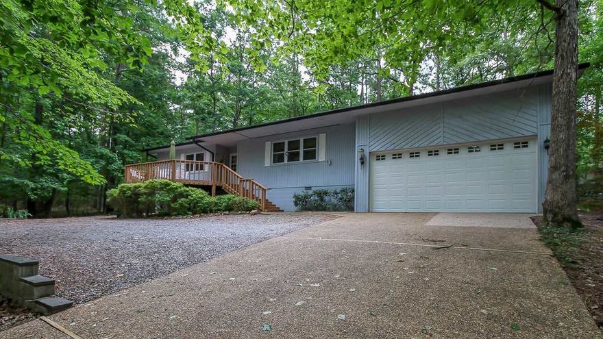 Conveniently located to the West Gate you will find this one owner home that is tucked back off the street giving you the privacy you desire.  The large deck on the front of the home will welcome your guests.  Enjoy your morning coffee or a good book in the sunroom!  There is a large heated and cooled room that can be made a workshop or third bedroom.  Oversized two car garage.  Love and care in every room just waiting for the new owner to enjoy.  Make sure this one is on your must see list!