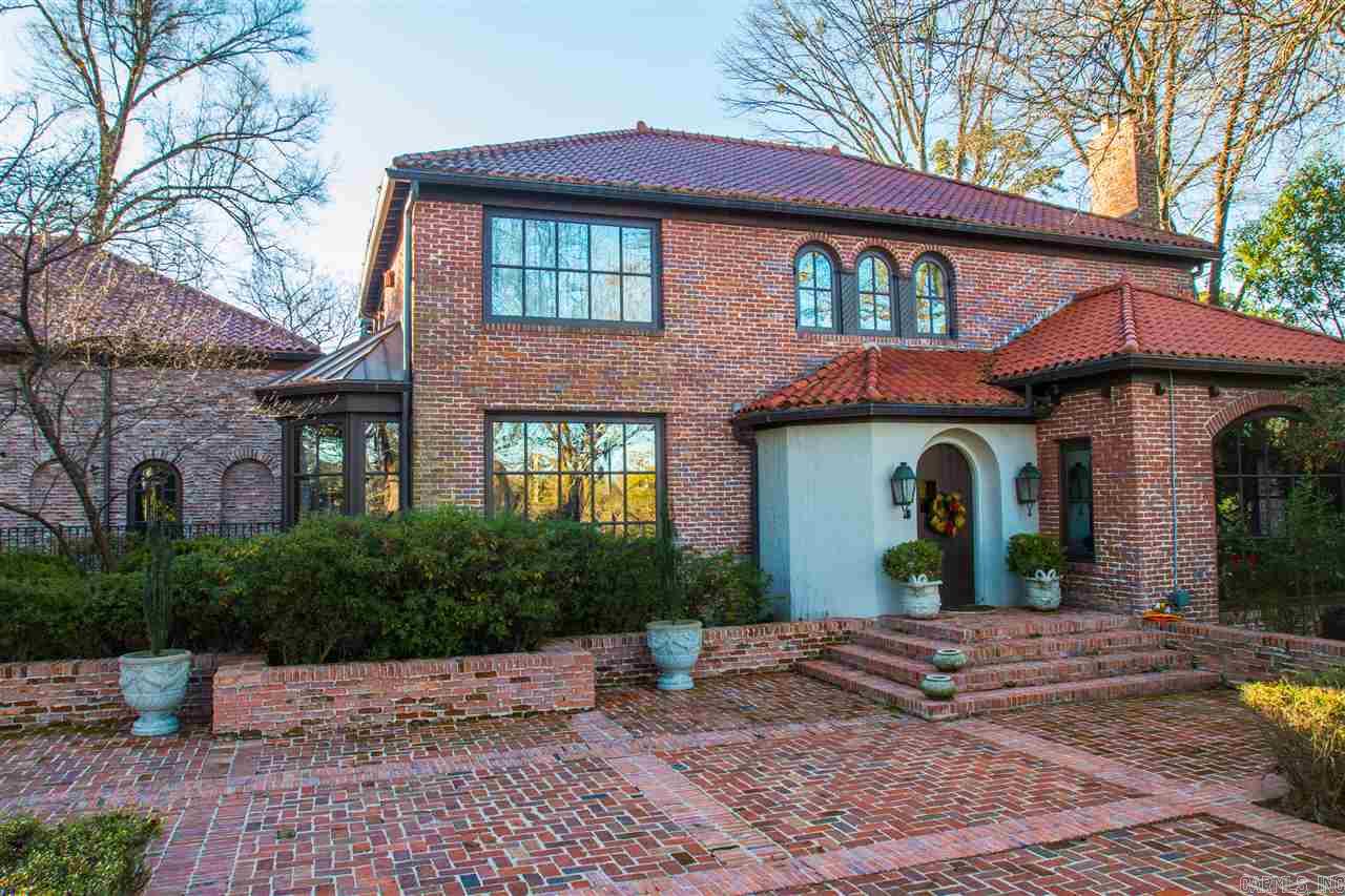 Stunning Edgehill home w/ exquisite living spaces. Numerous renovations and the pinnacle in quality craftsmanship. Unparalleled design and construction combine with old world charm to create a truly spectacular setting for family living and entertaining. Beautiful formal living room with fireplace and home office. Master suite on main level. Vaulted brick ceilings and floor to ceiling arched windows overlooking fabulous pool and immaculate grounds. Guest cottage- sf not included. Call for list of amenities