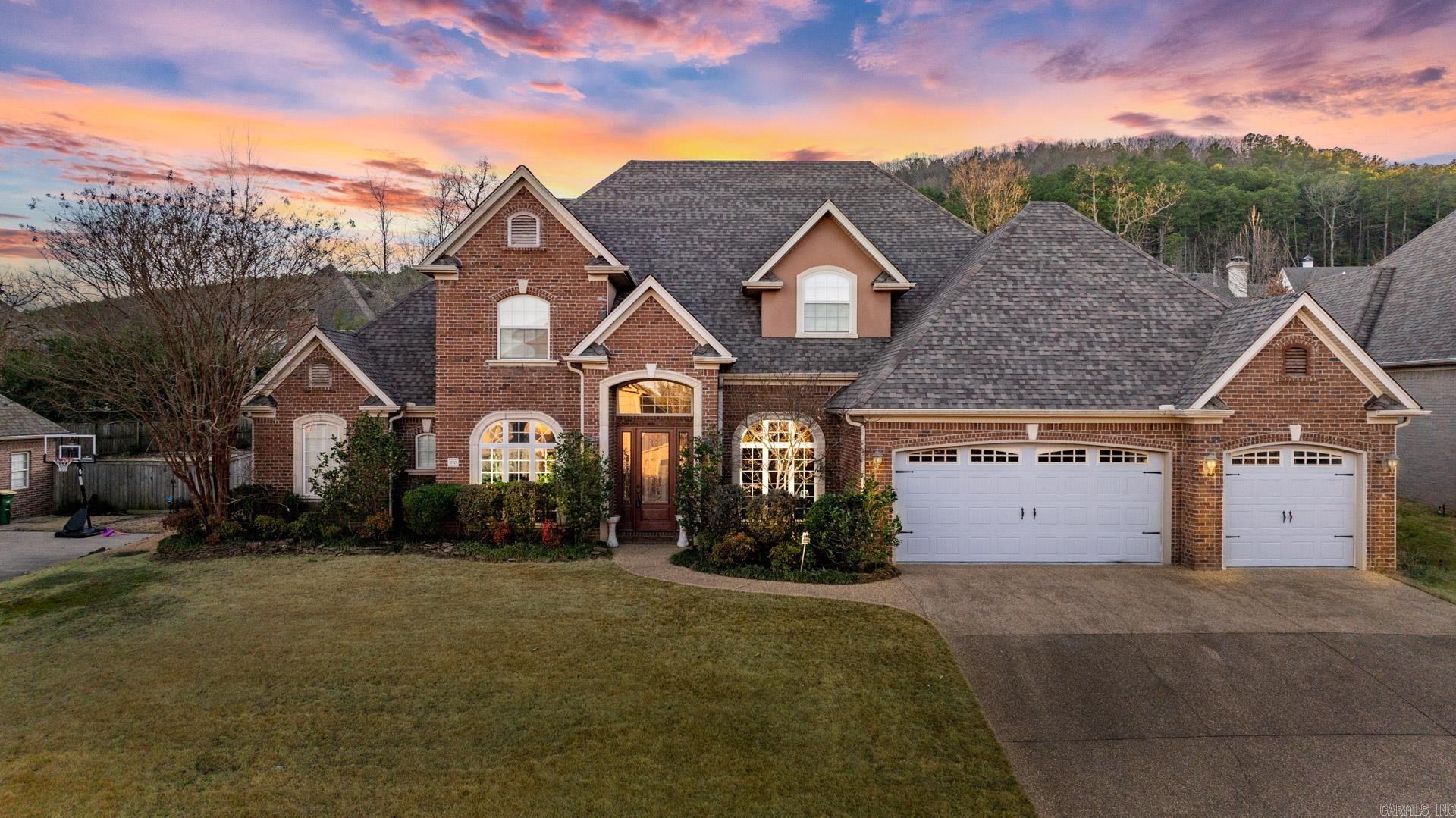 Brand new Roof! Welcome to this spectacular traditional home Better than NEW located in one of the most popular 'the Courts" of Chenal Valley! This stunning home offers the finest in architecture & finishes, it has great curve view and any rooms you may need; curved stairwell with wrought iron; high ceilings with 9 feet doors through out the house; elegant high quality hardwood floors; 2 living areas in the main level; large windows providing lots of natural light; plenty of built-ins and storage areas; master suite has a tray ceiling & sitting area; luxurious master bathroom features higher ceiling, jacuzzi bathtub, tiled shower and his and her vanities; master closet is huge; chef's kitchen has 5 burner gas cook top, double ovens, island, breakfast bar and dry bar next to it; designer trims throughout; x-large laundry has a vanity, lots of cabinetry and ironing stand; upstairs has 3 large bedrooms, bonus/game rm & 2 Baths; large mud room after entering from garage; floored attic storage; 2 patios in the back; fully fenced backyard; large 3 car garage with extra storage space. Move in before the New Year starts.
