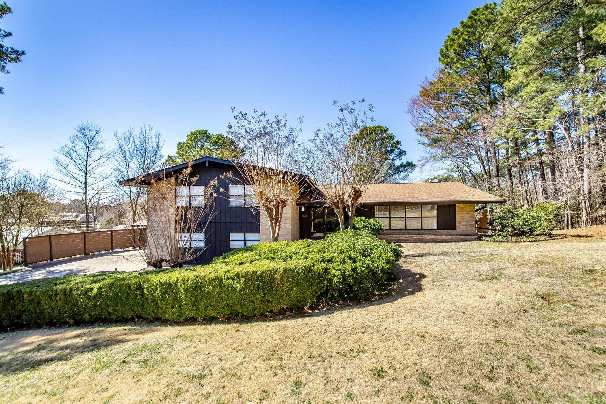 This beautiful Tri-Level home is move in ready. It is located close to downtown/oaklawn but still feels outside of the city. Walk from the front door into the living room, kitchen, and dining room. All the bedrooms are located upstairs, while you can go to the bottom level for your garage, laundry room (with mud sink and dedicated storage), and a secondary living room with a wood burning fire place. The comforts of your backyard offer a pool, children's playset and trampoline, with a moveable storage building. Speaking of storage which this house has in abundance there is a concrete safe room that can also serve as a secondary storage room located off of the garage.