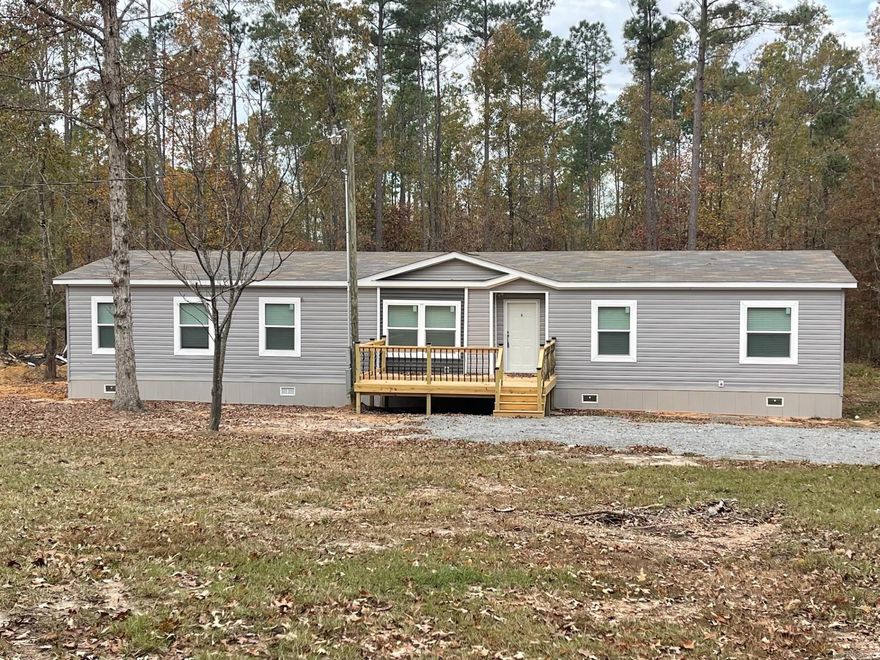 2023 Manufactured home on 2 acres.  Permanent foundation, large decks, all appliances are new. Home is New, be the first family to call this your home.  Has master bedroom suite for reading/office or for a newborn to be in the room with you.    Plenty of room to run and play on this property. quiet neighborhood close to town and shopping.  this will go fast, the home has been appraised and is now move in ready.  call listing agent today for your private showing.