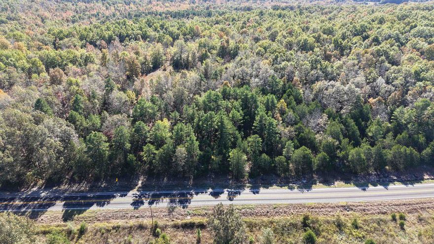 Nestled between Melbourne and Sidney, Arkansas, this 10-acre parcel boasts over 500 feet of highway frontage. With a landscape offering several attractive potential building spots and utilities already available, you’re free to bring your plans for a custom home, cozy cabin, or investment project to life—no restrictions to hold you back. The property is richly wooded and alive with wildlife, making it a true haven for those who love the outdoors. Deer and turkey roam the acreage, creating prime conditions for hunting or simply enjoying the serenity of nature. Tracts like this rarely come up in desirable north-central Arkansas, where versatility, convenience, and untouched natural beauty all come together. Whether you envision a rural getaway, a productive hobby farm, or a secluded homesite, this attractive acreage is ready for your ideas—all at just $75,000.