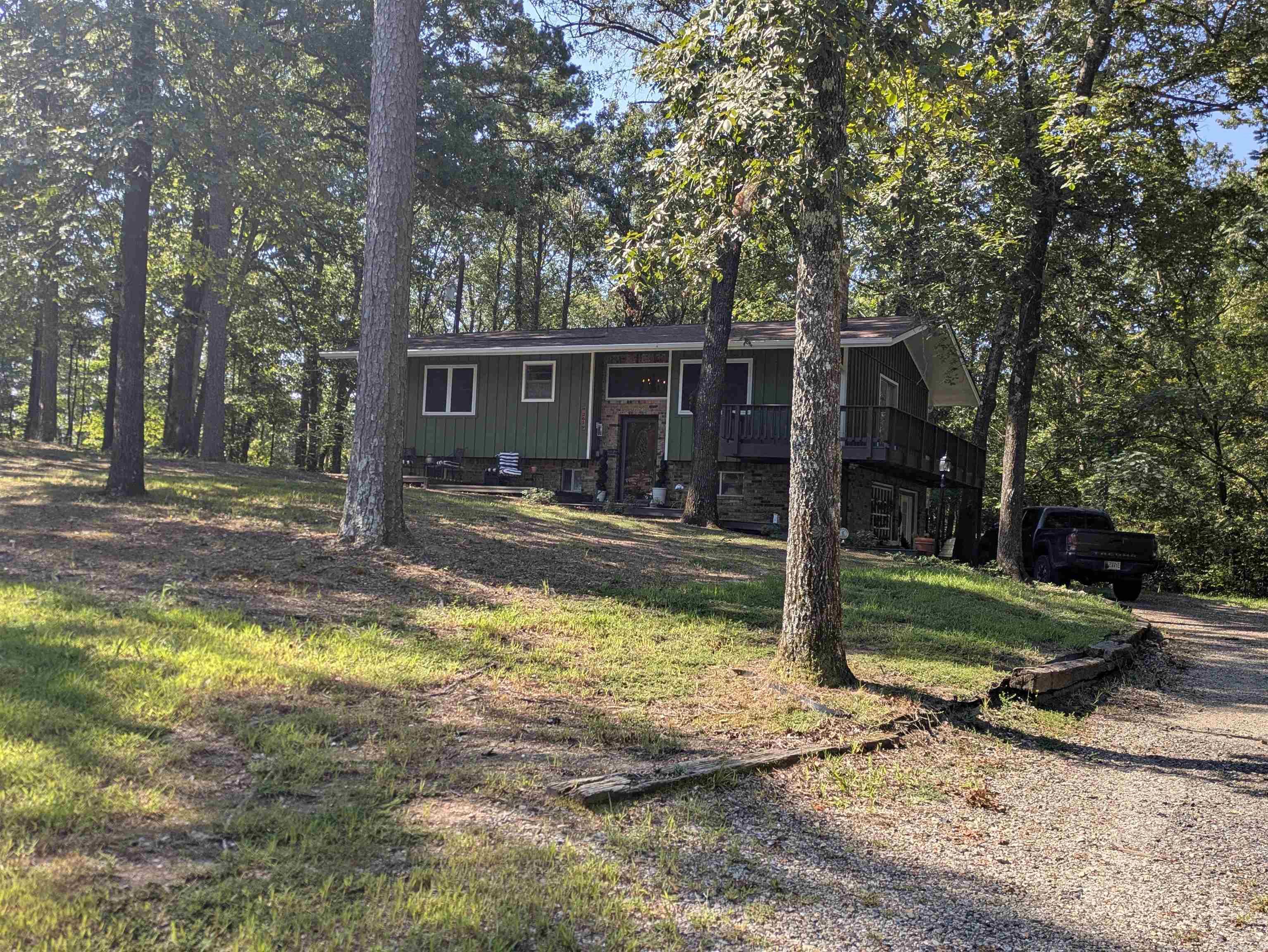 Recently Updated 4 Bedroom, 2 Bath Home on 1.92 Acres with Creek ā Mena, Arkansas. This 4 bedroom, 2 bathroom home has been recently updated and sits on 1.92 partially wooded acres just outside of Mena. The property offers a peaceful setting with a mix of open yard and shady mature trees, giving it plenty of natural ambiance. A wet-weather creek runs along the land, adding to the charm and country feel. Inside, updates bring a fresh, move-in ready appeal while keeping the home warm and inviting. With cozy living areas, comfortable bedrooms, and modern touches, itās designed for both everyday living and weekend relaxation. Enjoy the quiet of a country setting while still being close to town ā a rare find that combines updates, acreage, and natural beauty all in one.