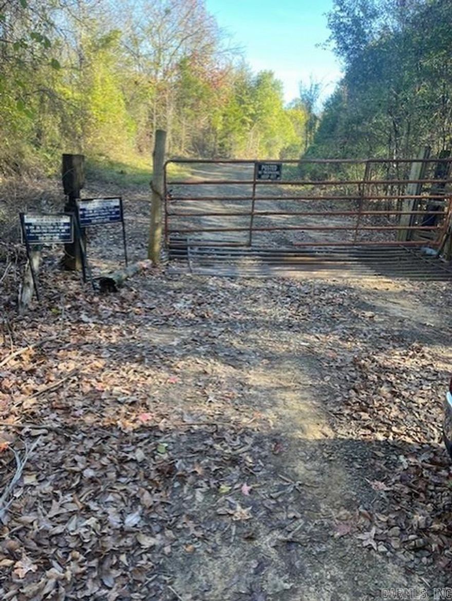 This 81.57 acre +/- wooded property offers a serene and natural setting, ideal for outdoor enthusiasts and nature lovers. The land is covered with a diverse mix of mature trees, providing a peaceful and private environment. Wildlife abounds throughout the area, with frequent sightings of deer, birds, and other native species. Trails wind through the woods, perfect for hiking, hunting, or simply enjoying the beauty of the landscape. With its expansive acreage and rich natural resources, this property presents a rare opportunity for those seeking a retreat or an investment in a lush, undisturbed natural environment. Bordered by land owned and maintained by the Arkansas Game & Fish Commission.