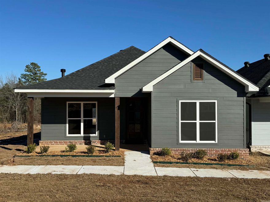 Stunning Craftsman home by Graham Smith Construction in Bryant's most desired neighborhood! Enjoy custom designer curated finishes throughout as well as a premier location that has a neighborhood pool within walking distance! Enjoy front porch living, a weekend farmers market, and so much more! Move into this stunning home perfectly situated in Pasley Park with a front entrance personal greenspace. Home to be completed January 2024.