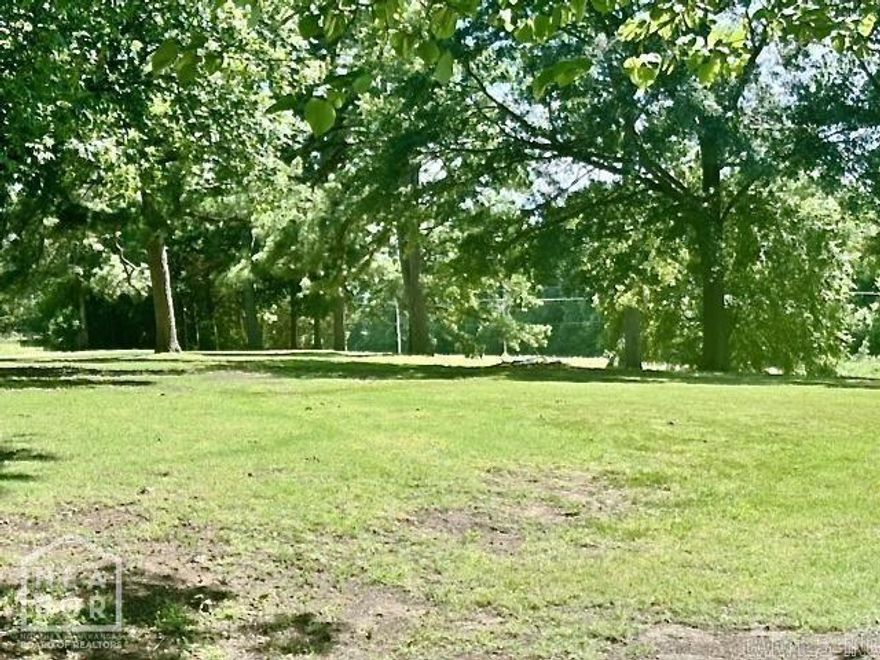 This is a beautiful 3 bedroom 3 bath home that is move in ready. This all brick construction home has a drive through breezeway, almost 4 acres of ground, and a huge rear deck. It offers privacy, peace of mind, and that great feel of country living. Inside is a very spacious floor plan. It offers multiple living areas that are both spacious and full of wonderful natural light! The kitchen has lots of cabinet and countertop space. All bedrooms are very roomy and have great closet spaces. This well designed home gives everyone plenty of privacy as well as large rooms that are perfect for gathering together. Outside, the rear deck overlooks beautiful open ground for watching those gorgeous sunrises everyday! call today for a personal tour.