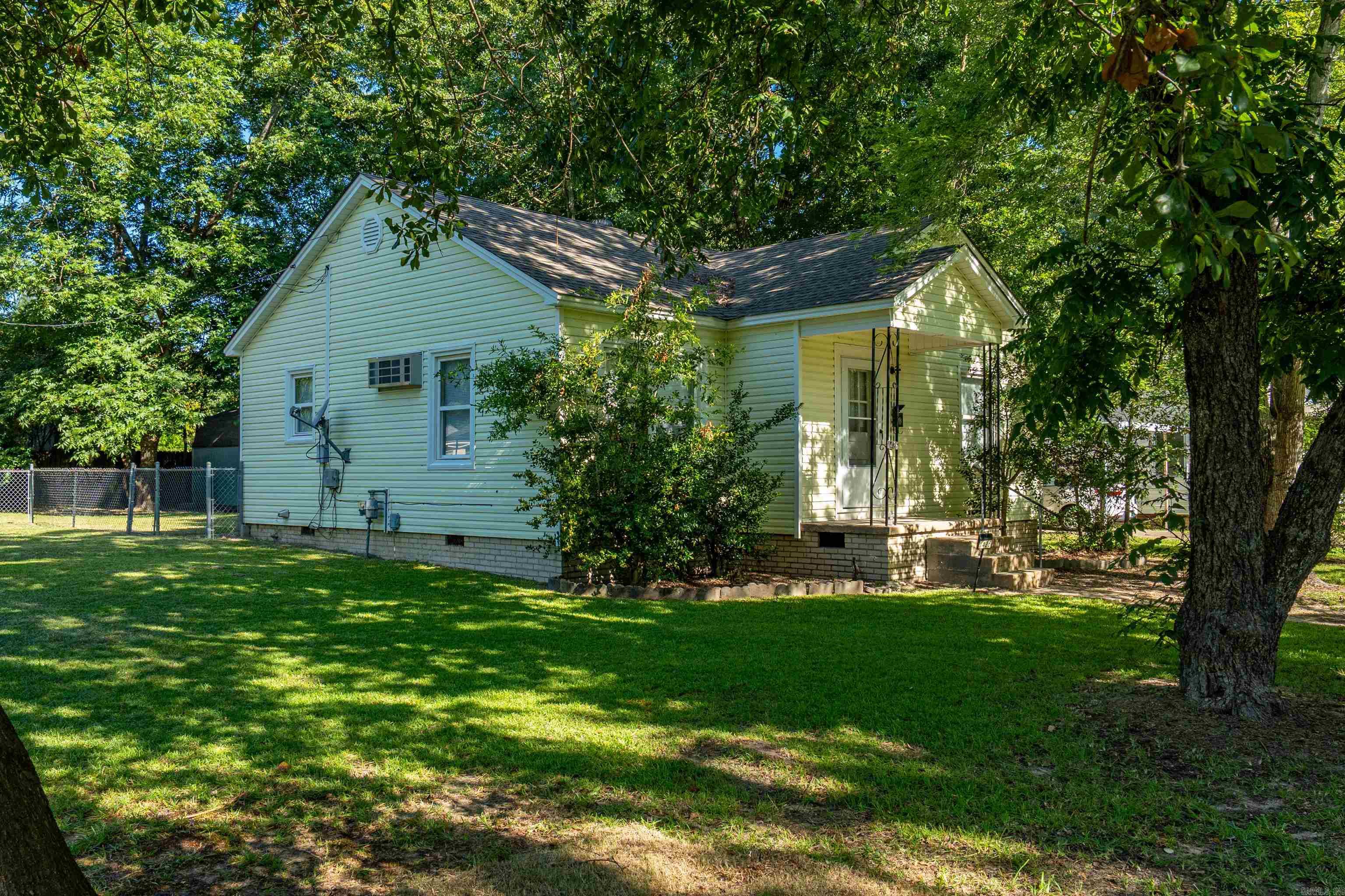 Charming & Updated Home with Spacious Living! This adorable home welcomes you with a cute front stoop that adds charm and character. Inside, youāll find large rooms, thoughtful updates like a new water heater, and a solid build that offers peace of mind. Step out back to enjoy a fully fenced, beautifully maintained yardāperfect for relaxing or entertaining. Located on a quiet, well-kept street, this home is ready for you to make lasting memories. Donāt miss your chance to see this one!