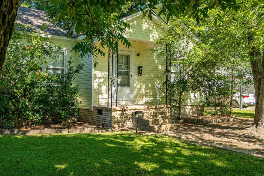 Charming & Updated Home with Spacious Living!  This adorable home welcomes you with a cute front stoop that adds charm and character. Inside, you’ll find large rooms, thoughtful updates like a new water heater, and a solid build that offers peace of mind. Step out back to enjoy a fully fenced, beautifully maintained yard—perfect for relaxing or entertaining. Located on a quiet, well-kept street, this home is ready for you to make lasting memories. Don’t miss your chance to see this one!