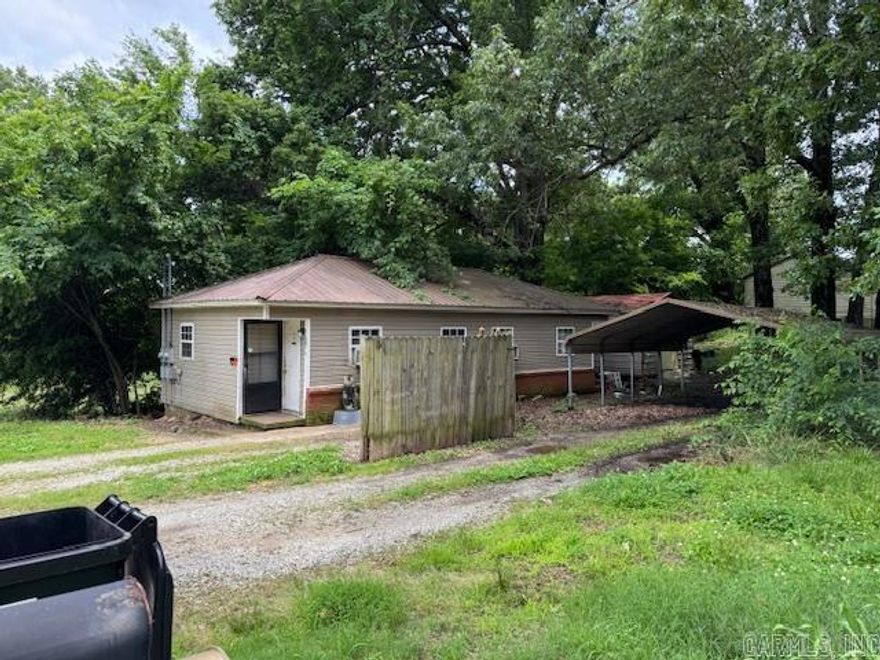 RENTED DUPLEX FOR SALE!!  1301A and 1301B are currently rented with the tenants paying well and wanting to stay. Side A is 1 bedroom, 1 bathroom, living room and kitchen combo and rents for $375 a month. Side B is 1 bedroom, 1 bathroom, living room and kitchen combo and rents for $250 a month. 2024 grossed $7500 for the year. Taxes are $276 per year. The duplex is 776 square foot, there is an 18X20 carport cover and a 12X16 metal building. City utilities. Call for a tour!