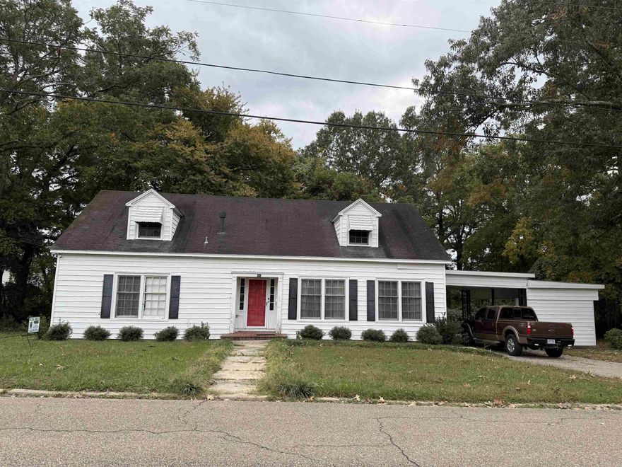 Spacious 2-story home featuring 3BR/2.5BA, a huge kitchen with appliances included, large formal living room, wet bar, and fireplace suitable for electric logs with potential for gas conversion. Home offers a breakfast nook, formal dining area, central heat/air, large master bedroom with your dream closet, and a master bathroom with shower and large jacuzzi tub. Additional features include a gas stove, beautiful staircase, and a large metal workshop with endless opportunities. Move-in ready with abundant space inside and out.