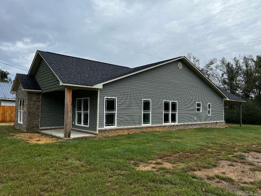 !!NEW CONSTRUCTION!! This 3 bedroom 2 bath home is thoughtfully designed with the modern homeowner in mind. Open concept kitchen/dining/den with beautiful LVP flooring and gorgeous lighting. The primary suite is positioned in the rear of the home for privacy and comes complete with a large walk in custom closet and spacious ensuite with double vanity and plenty of storage. In the front of the home, you'll find the 2 guest bedrooms with walk in closets and hallway bath. The light granite countertops, modern paint colors and vaulted ceilings give this home an open airy feel. An abundance of natural light highlight the custom features of this home. Call us or your favorite Realtor for your private showing. *preapproval required for showing