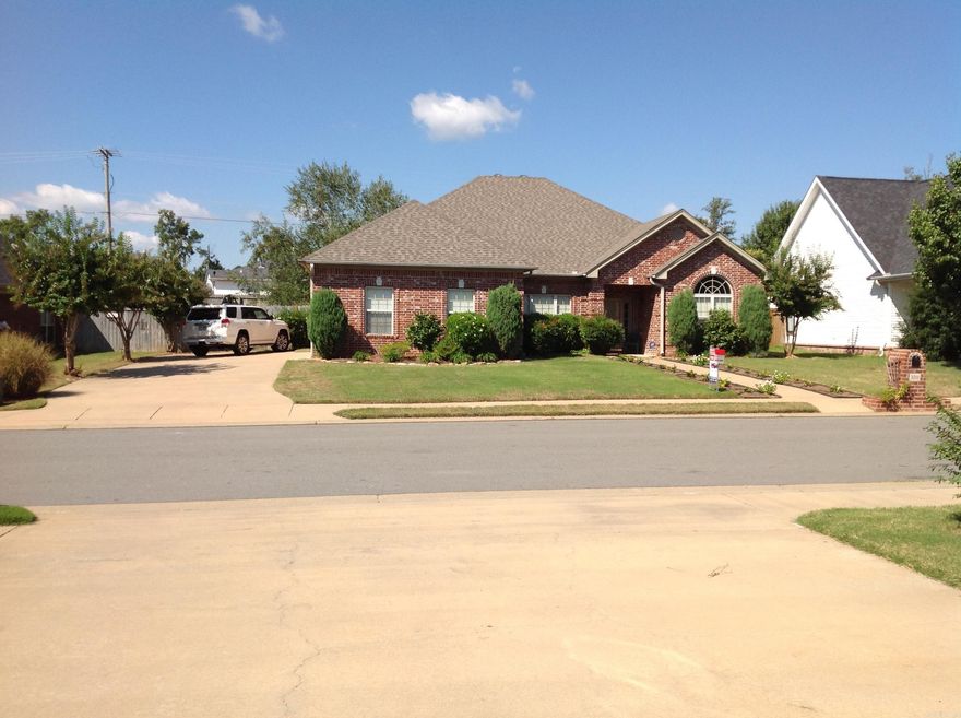 ONE Owner Home, built 2002. New roof 2025. Brick except for back. Well Kept Home, custom blinds, fenced with 10 FT gate. Side loading garage. Floored attic, Master bedroom separate. Concrete Patio.