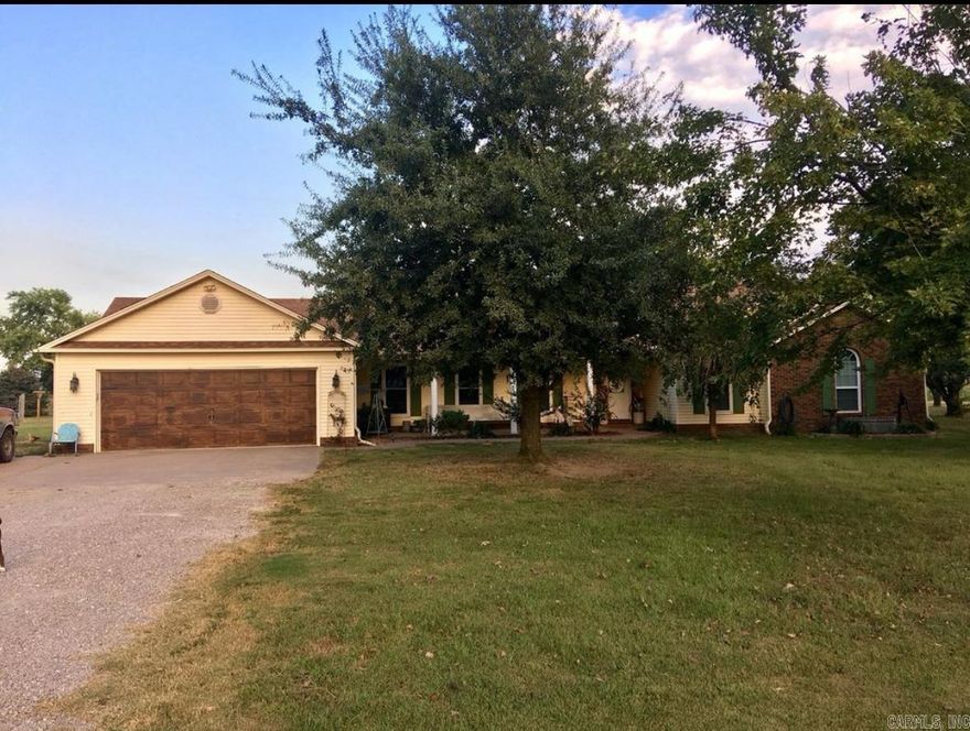 3976 CR 528 Rector, AR (Nimmons-Carryville area) is a beautiful 4BR, 3BA, 3,032sqft home sitting on 2.67 acres. The property has been fenced and cross fenced for horses or cattle. It comes with a huge 30'x54' shop,  16'x24' shop, and a perfect little chicken house! There is a two car garage, sunroom, big bonus room, large bedrooms, vaulted ceiling in the den! This stunning property has too much to list!! You've got to see this one!!