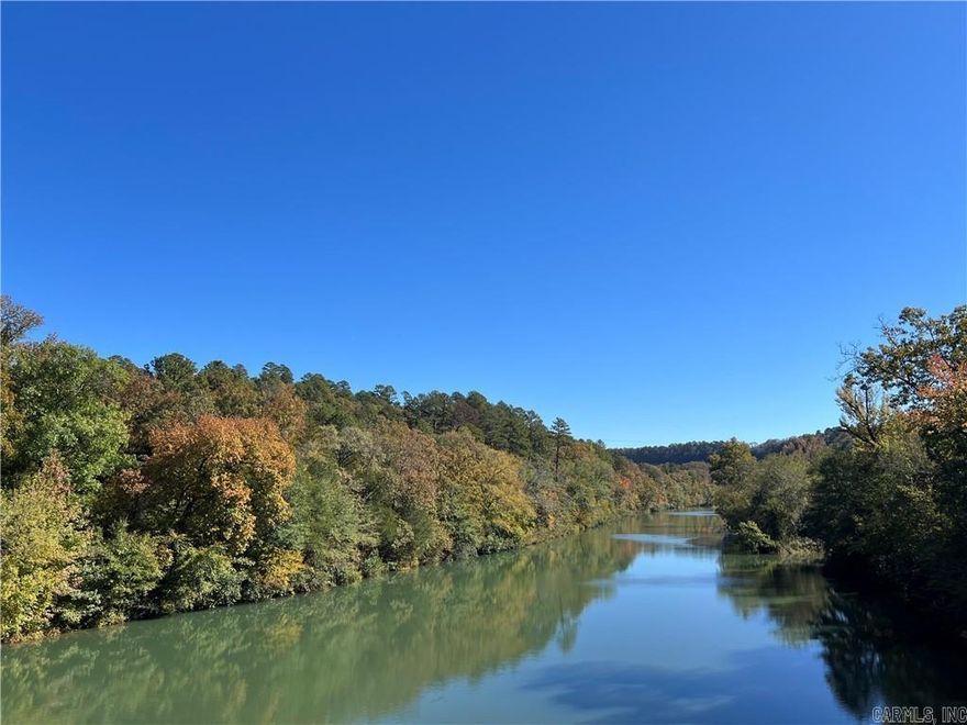 BIG PINEY Frontage Over 2 Acres bordering Piney Creek and bridge this property offers 2 Homes, The Smaller home is a 2 Bedroom, 1 Bath Home with sitting porch. The larger home offers a split floor plan with the largest room offering its own bath with walk in shower and walk in Closet. Both homes have permanent Brick Foundation and Improved Roofs with Porches. Large RV Parking Carport, Also a detached 2 Car Carport and a 2 Car attached Garage too. Chicken Coop, Fire pit, Flowing Creeks, Large Trees, A Storm Shelter is on the land. Walk to the Creek and swim or enjoy year round Fishing at it finest in your front yard. Large rock formations with Nature at its finest. This property has something for everyone but especially the Nature Lovers. Would make a great VRBO or multi family investment With Piney Bay Park just minutes away so Call for your Showing appointment Today!