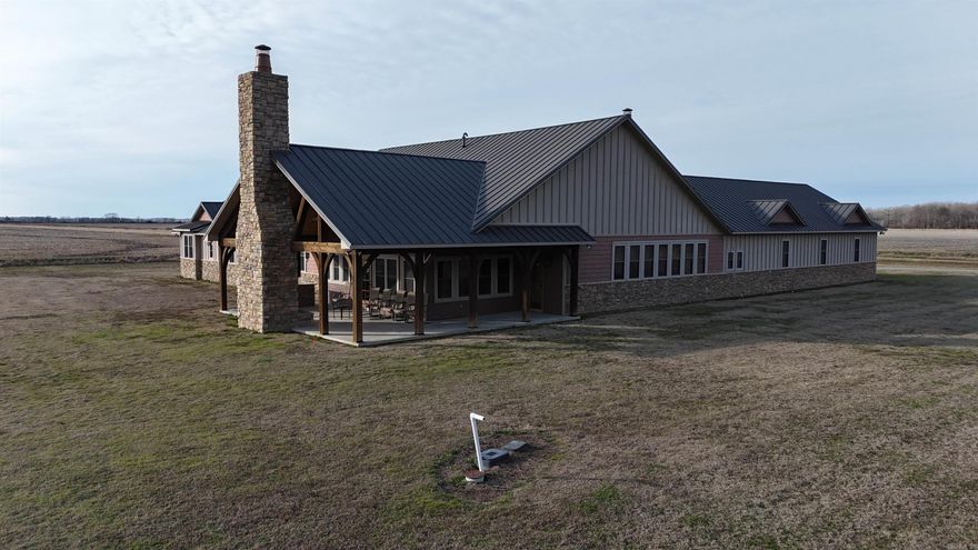 Big Cypress Creek Grand Lodge & Waterfowl Reserve is a rare 311± acre legacy waterfowl property in Eastern Arkansas along Big Cypress Creek in Monroe County—an area long known for consistently holding mallards. With two permanent blinds and natural stand-and-shoot spots tucked along the creek, it delivers the classic Arkansas timber hunt built on tradition. The habitat is dialed in: creek-side cover, conservation-designated areas, and two east-side fields typically planted in rice to attract and hold ducks. Two boat houses and two boats make getting to the action easy at daylight or for afternoon setups. Just 12 miles north near Hwy 49/79 on McKoy Lane, the elegant 6,100± sq ft lodge elevates the entire experience. A grand gathering room with a massive rock fireplace, bar, and spacious kitchen/dining areas set the tone for entertaining. Six luxury suites—each with a full walk-in shower and cedar closet—offer true retreat-level comfort. Add a gun room, personal lockers, and purpose-built spaces including a cleaning room and wader room, and every detail is designed for a premium sporting lifestyle.  Lodge can be purchased separately.